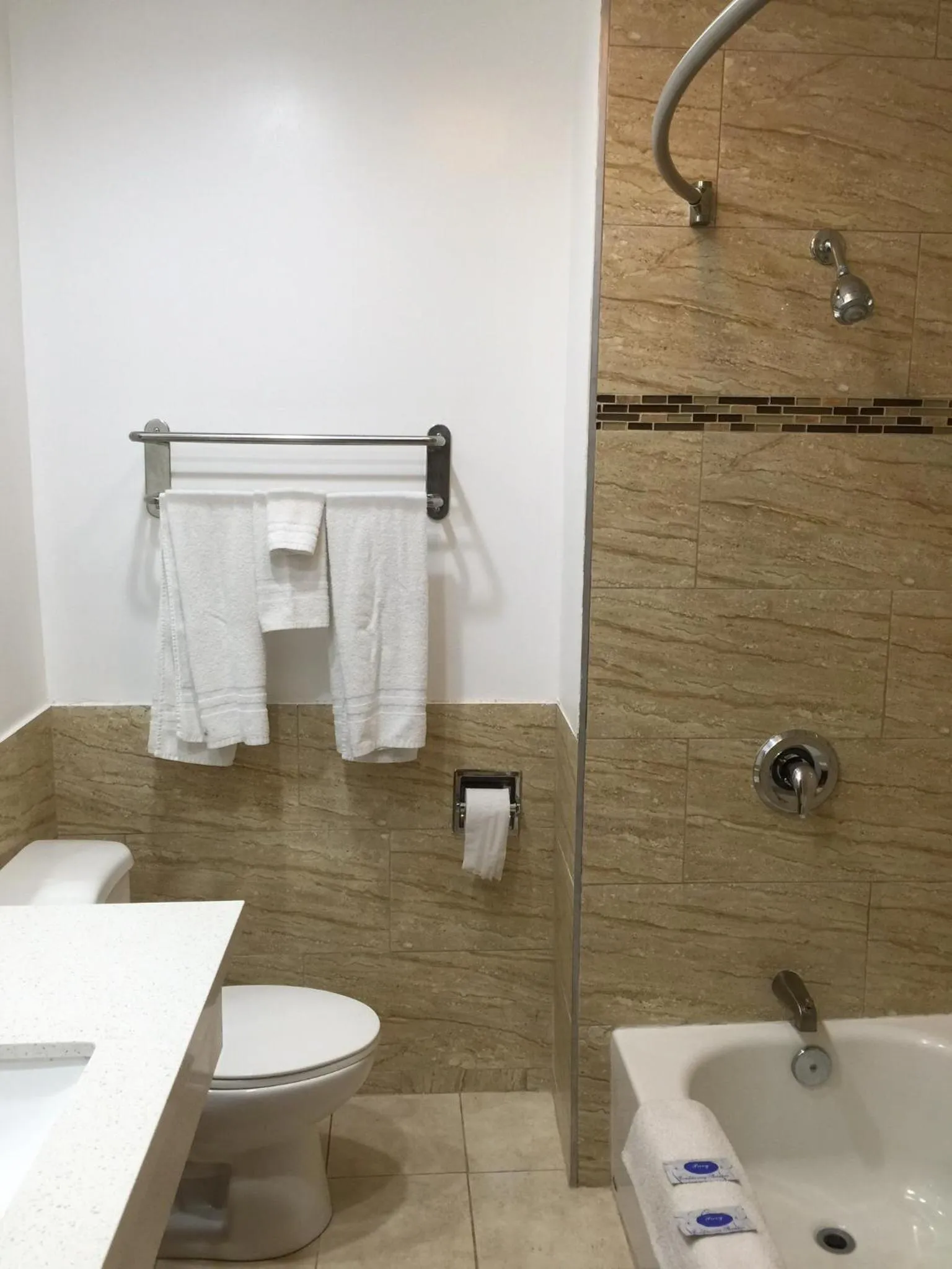 Toilet in Crenshaw Inn Motel