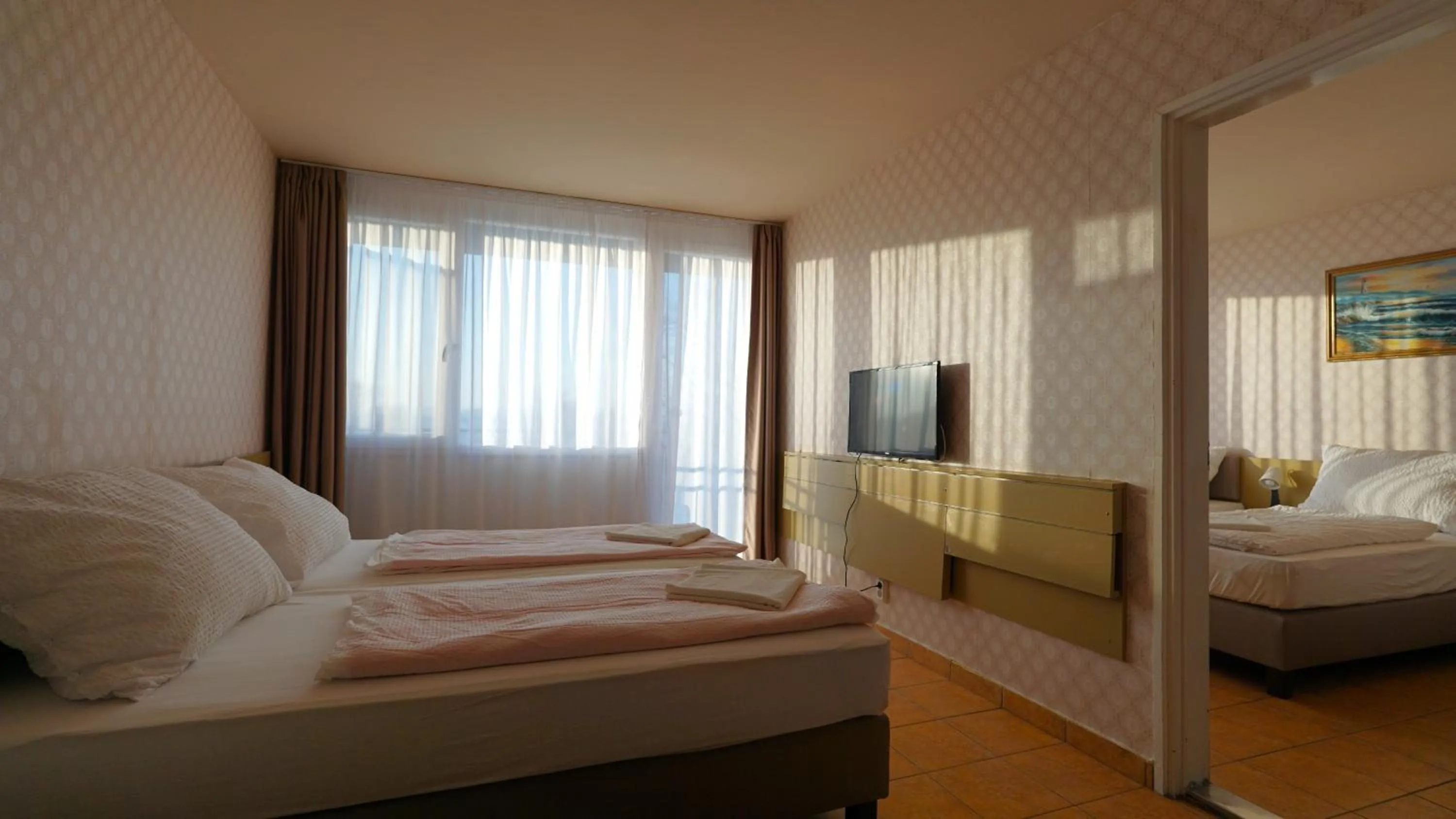 Photo of the whole room, Bed in Plazs Hotel Siófok