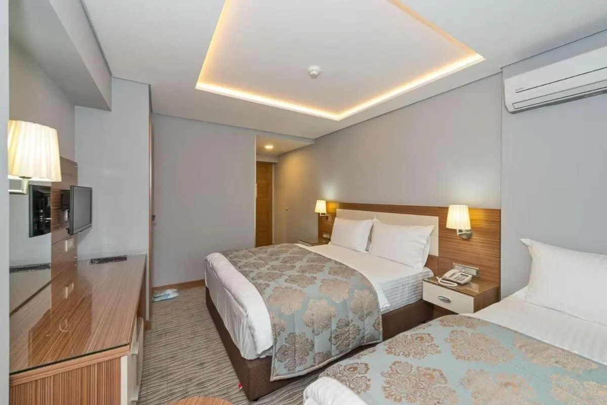 Bed in Floransa City Hotel