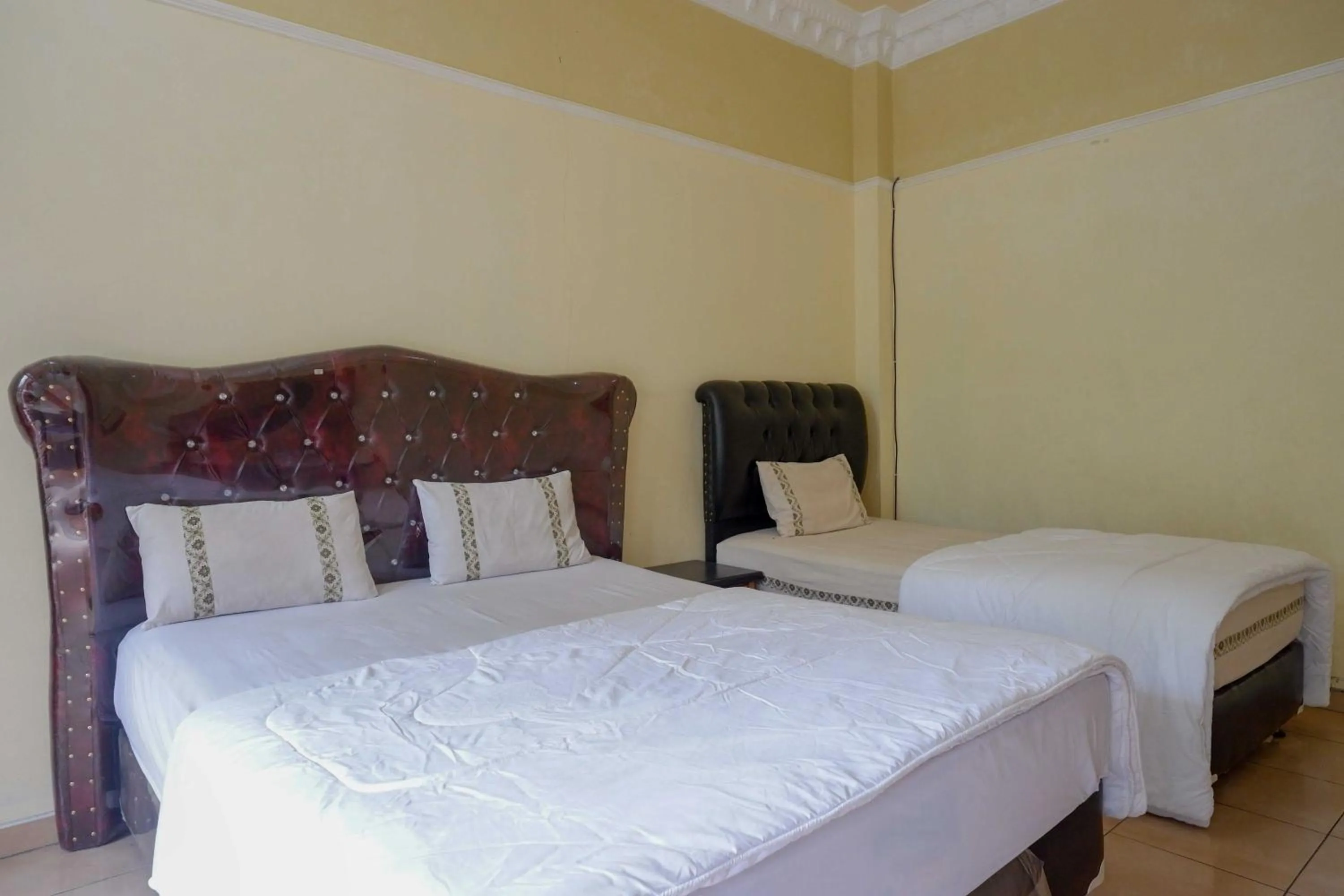 Bedroom, Bed in Urbanview Hotel Bergas Indah Bandungan by RedDoorz