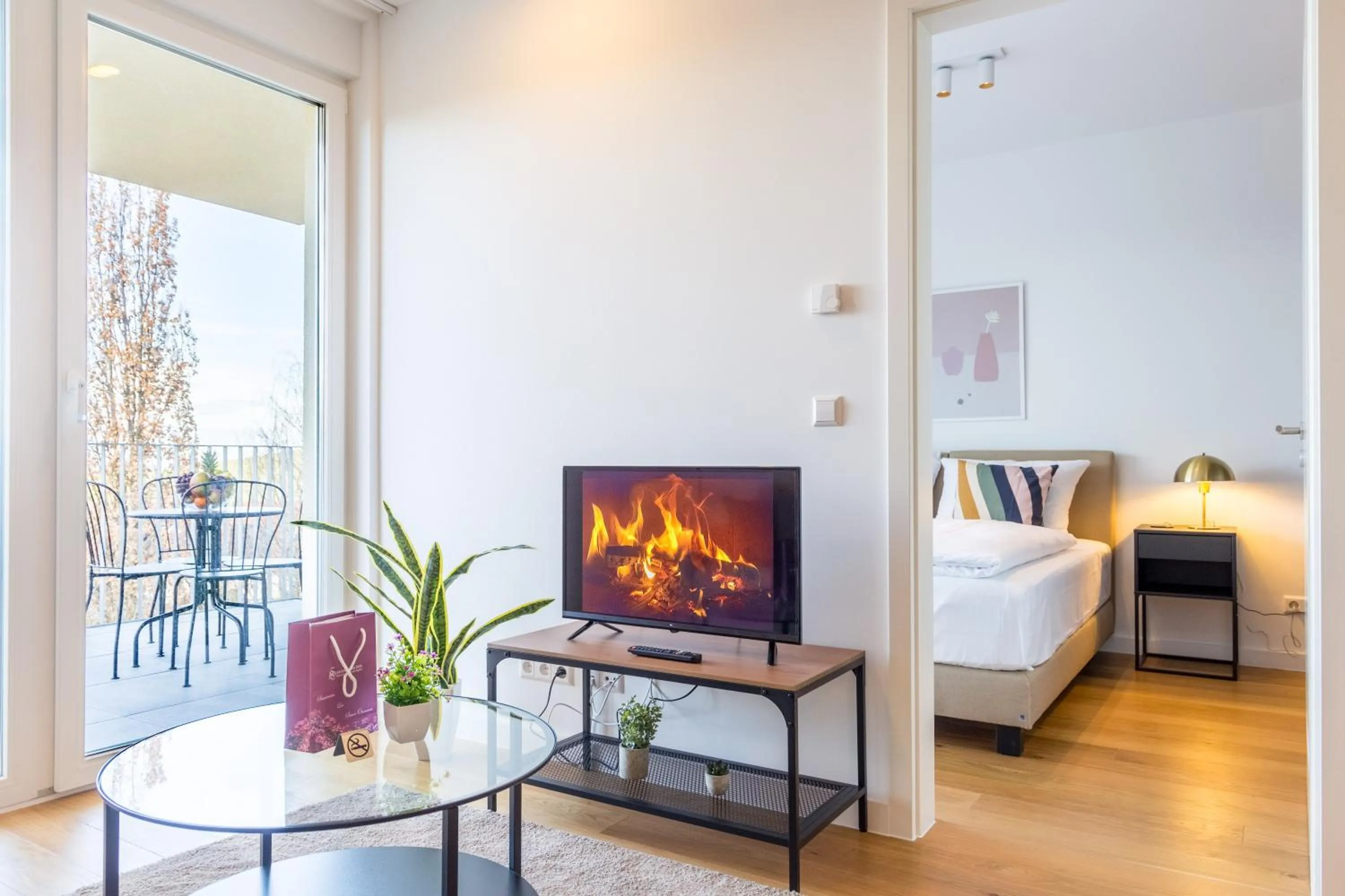 TV and multimedia, Bed in living TIMELESS - Adler Apartments Sasbachwalden