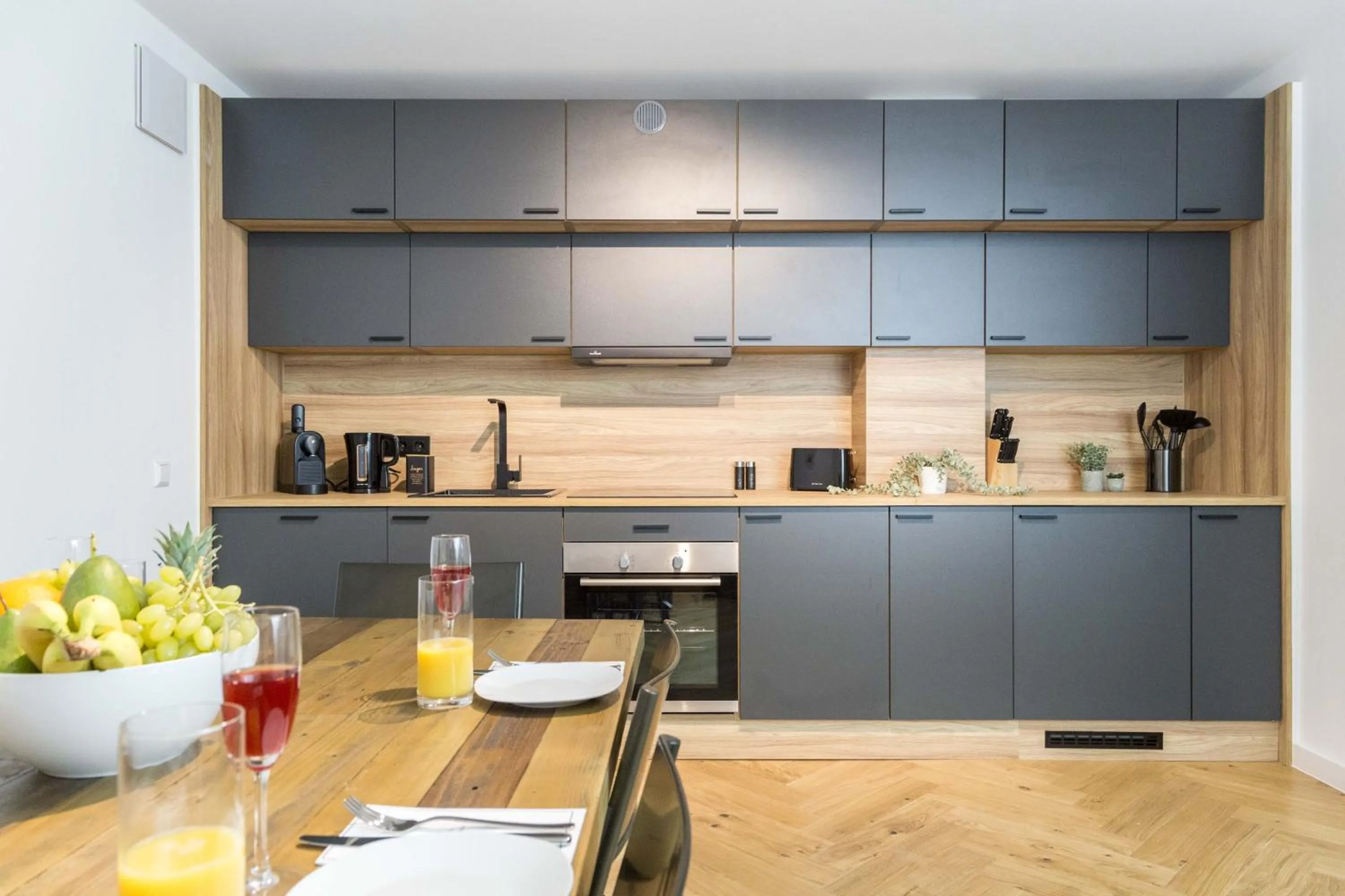 stove in living TIMELESS - Adler Apartments Sasbachwalden