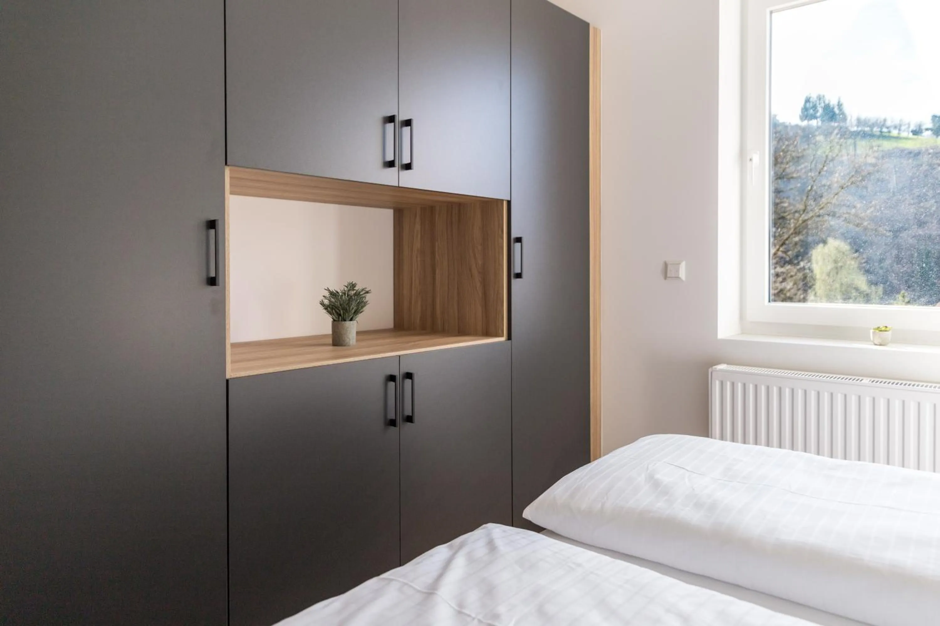 Bed in living TIMELESS - Adler Apartments Sasbachwalden