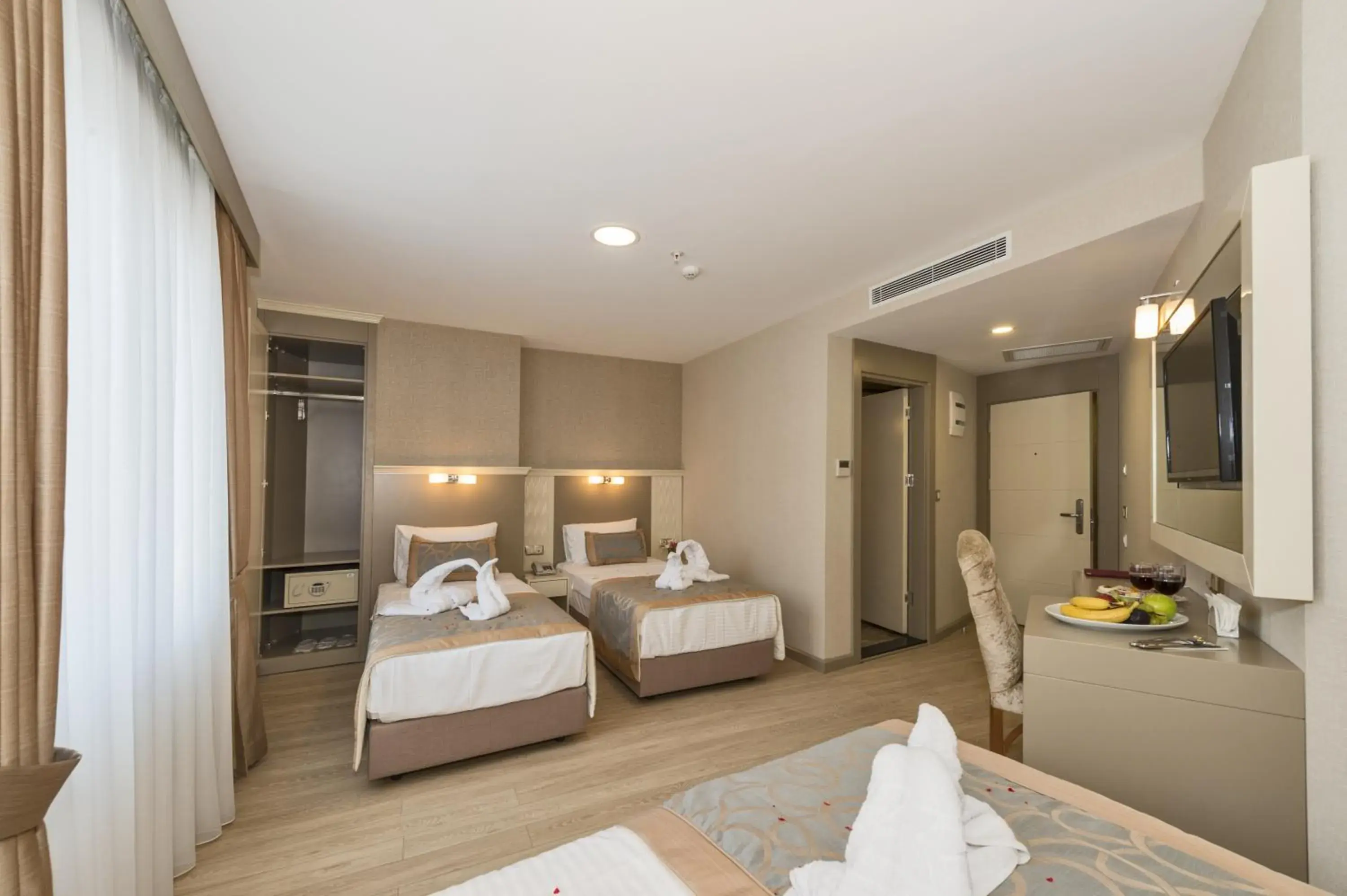 Standard Triple Room in Marcello Hotel Standard Triple Room in Marcello Hotel