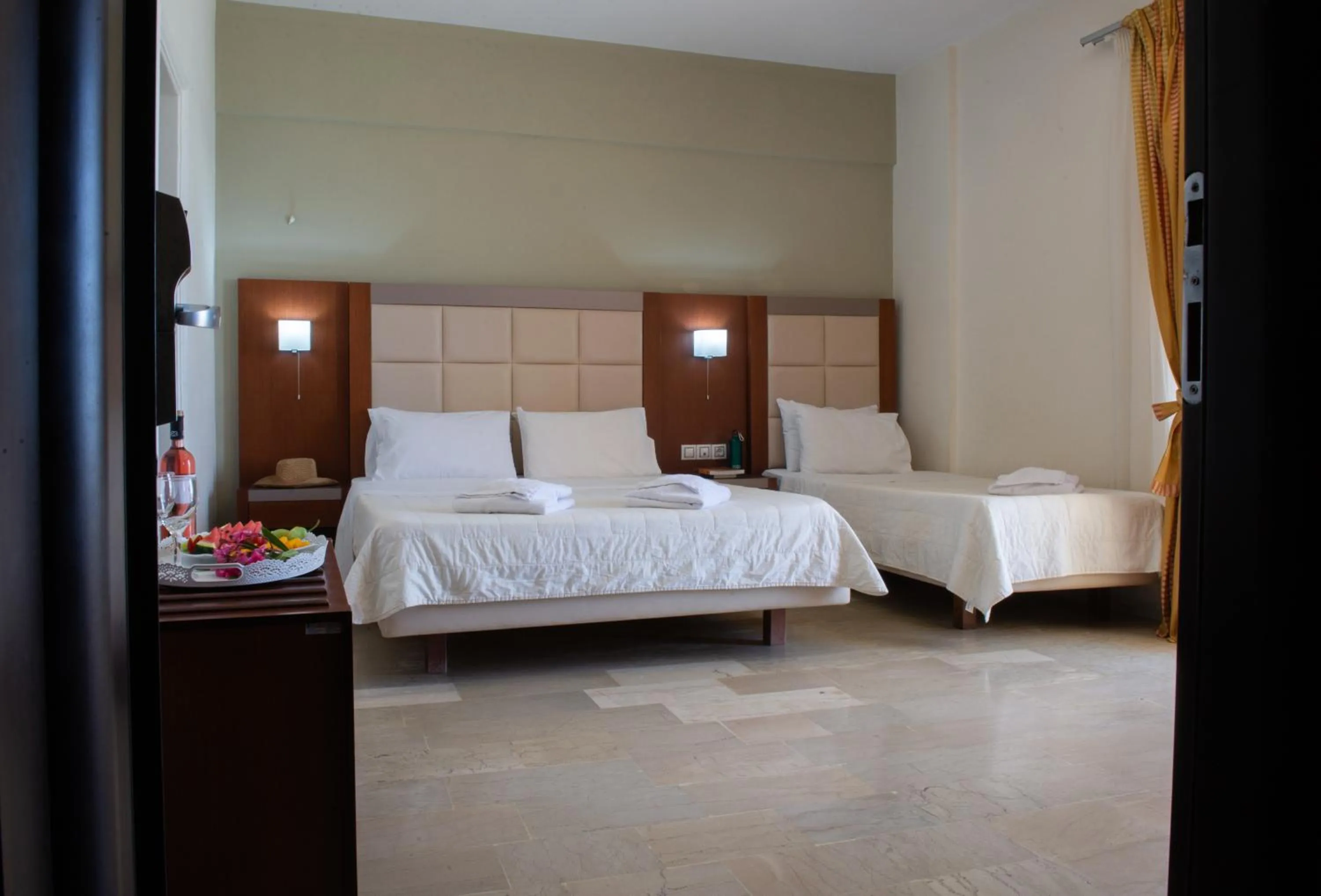 Bed in GOLDEN SUN Κokkoni Beach Hotel