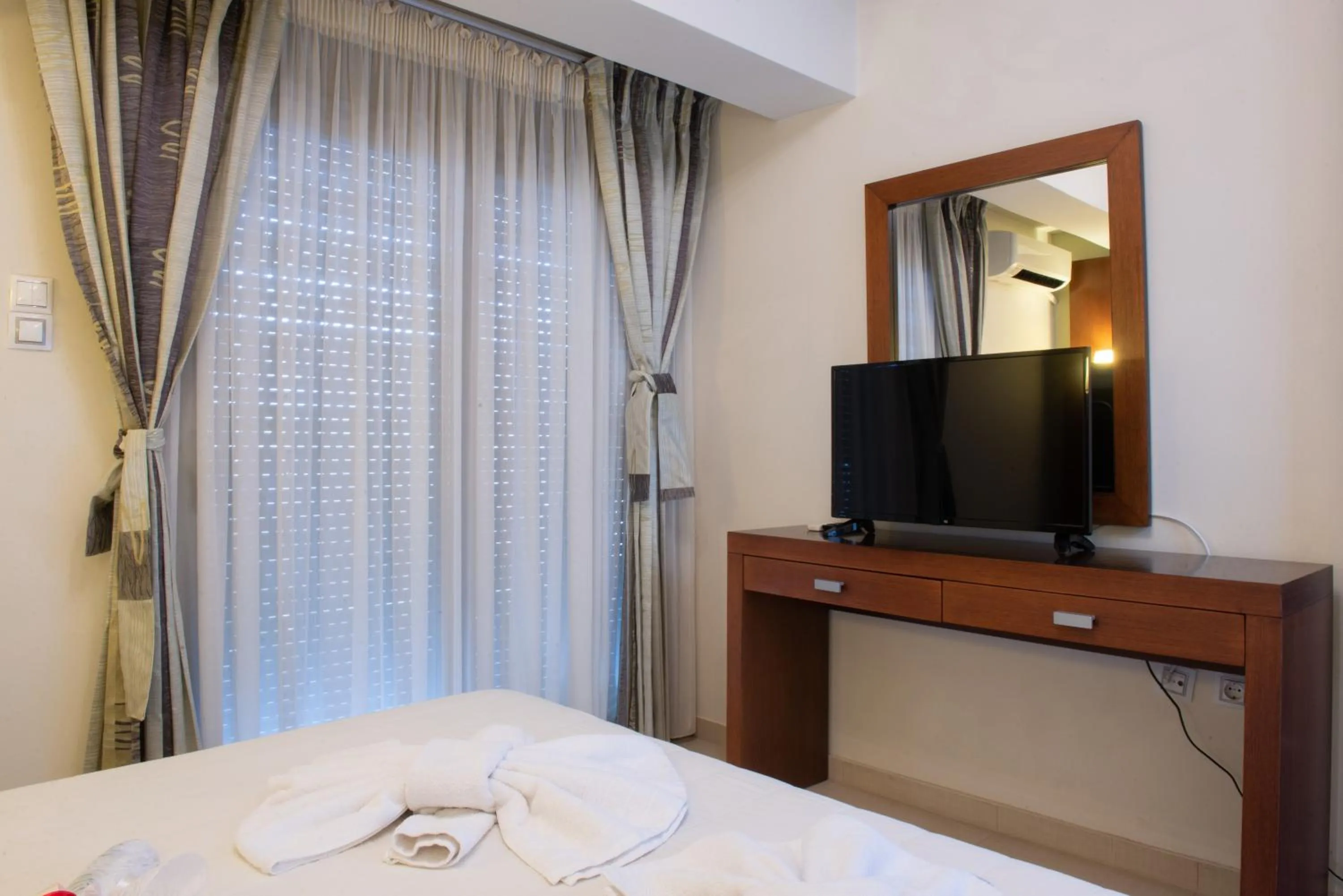 Bed in GOLDEN SUN Κokkoni Beach Hotel