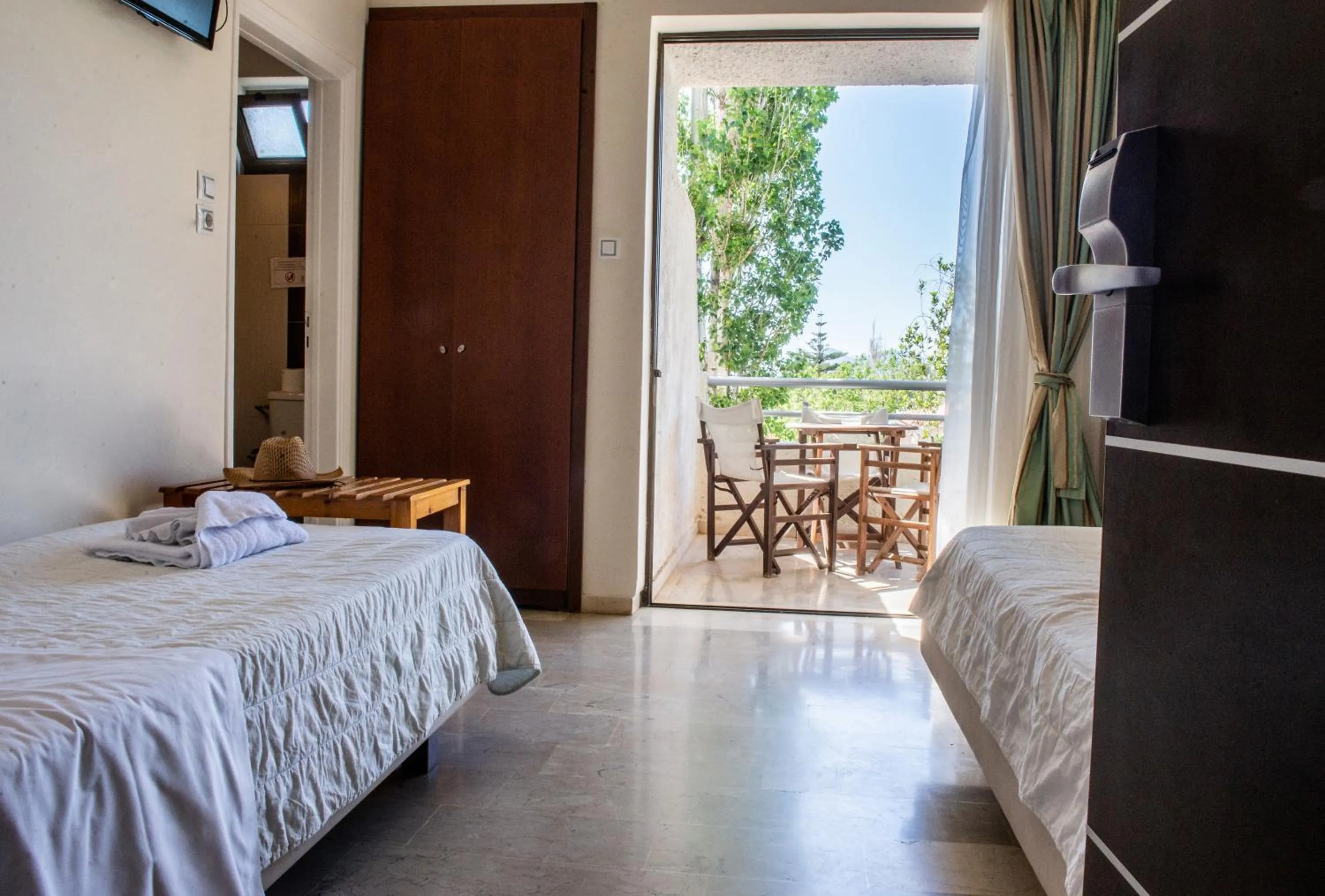 Bed in GOLDEN SUN Κokkoni Beach Hotel