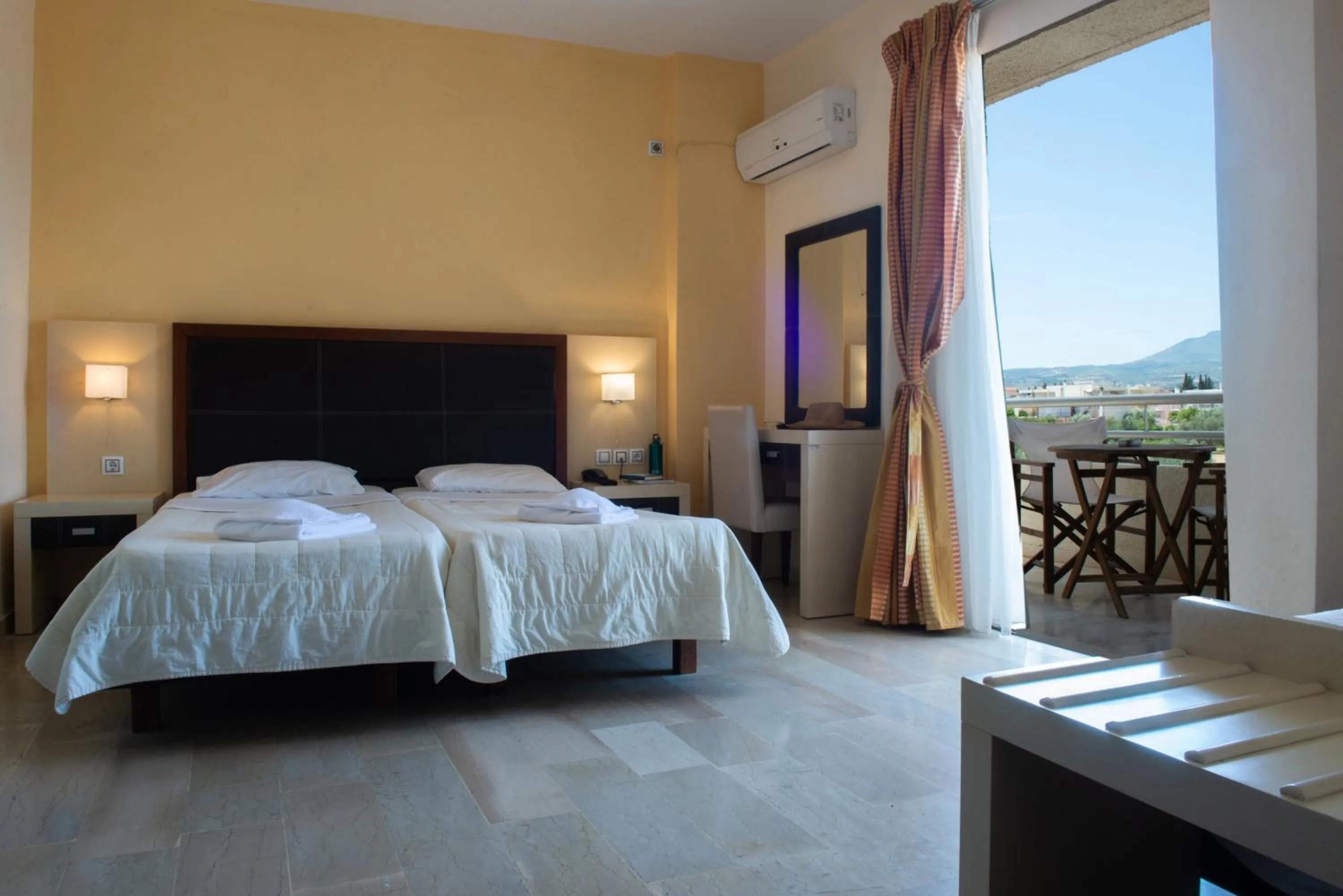 Bed in GOLDEN SUN Κokkoni Beach Hotel