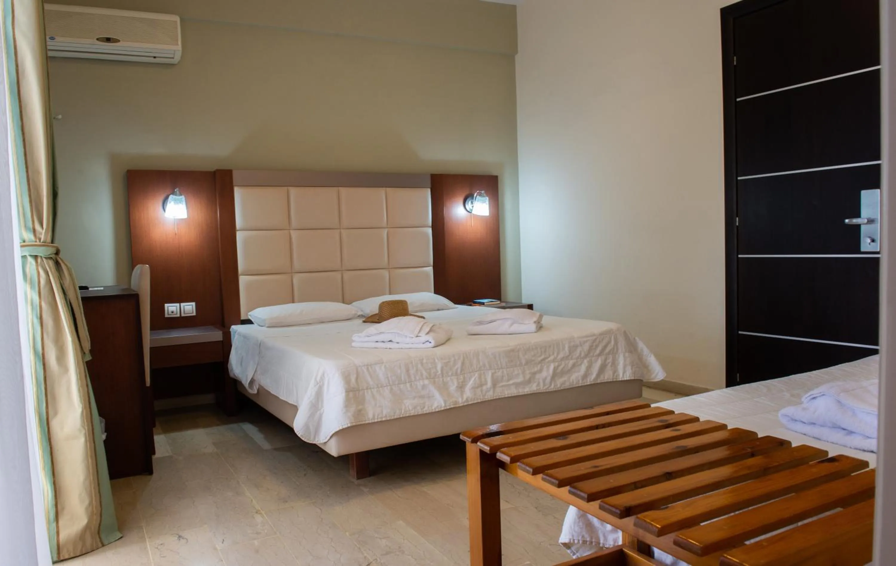 Bed in GOLDEN SUN Κokkoni Beach Hotel