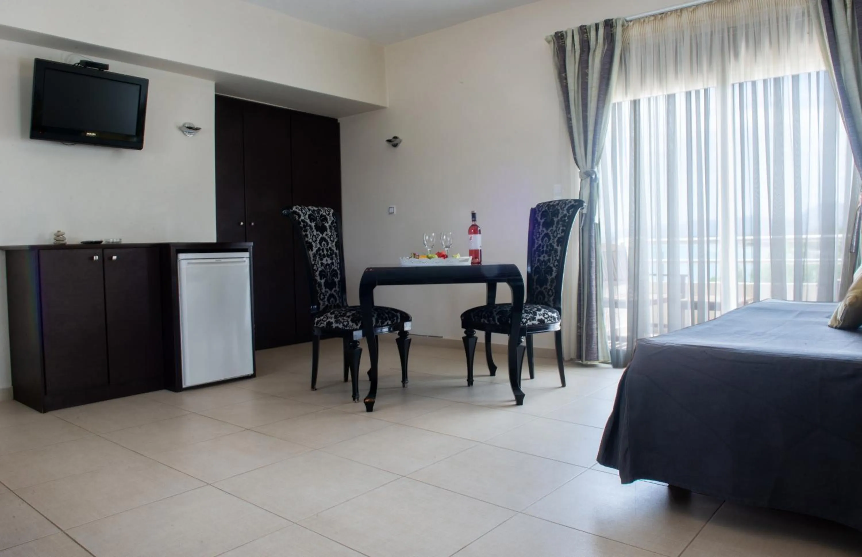 Bed in GOLDEN SUN Κokkoni Beach Hotel