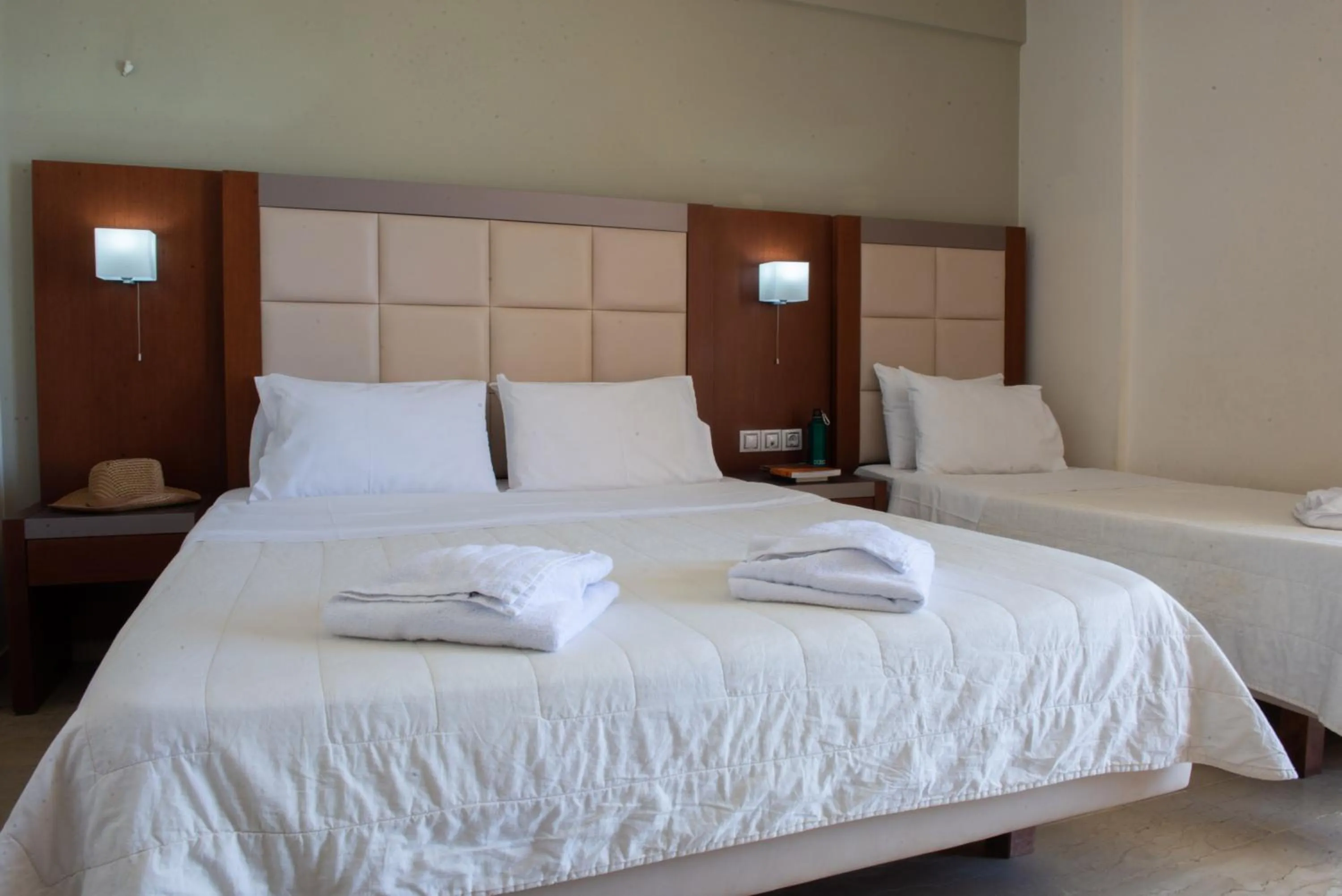Bed in GOLDEN SUN Κokkoni Beach Hotel