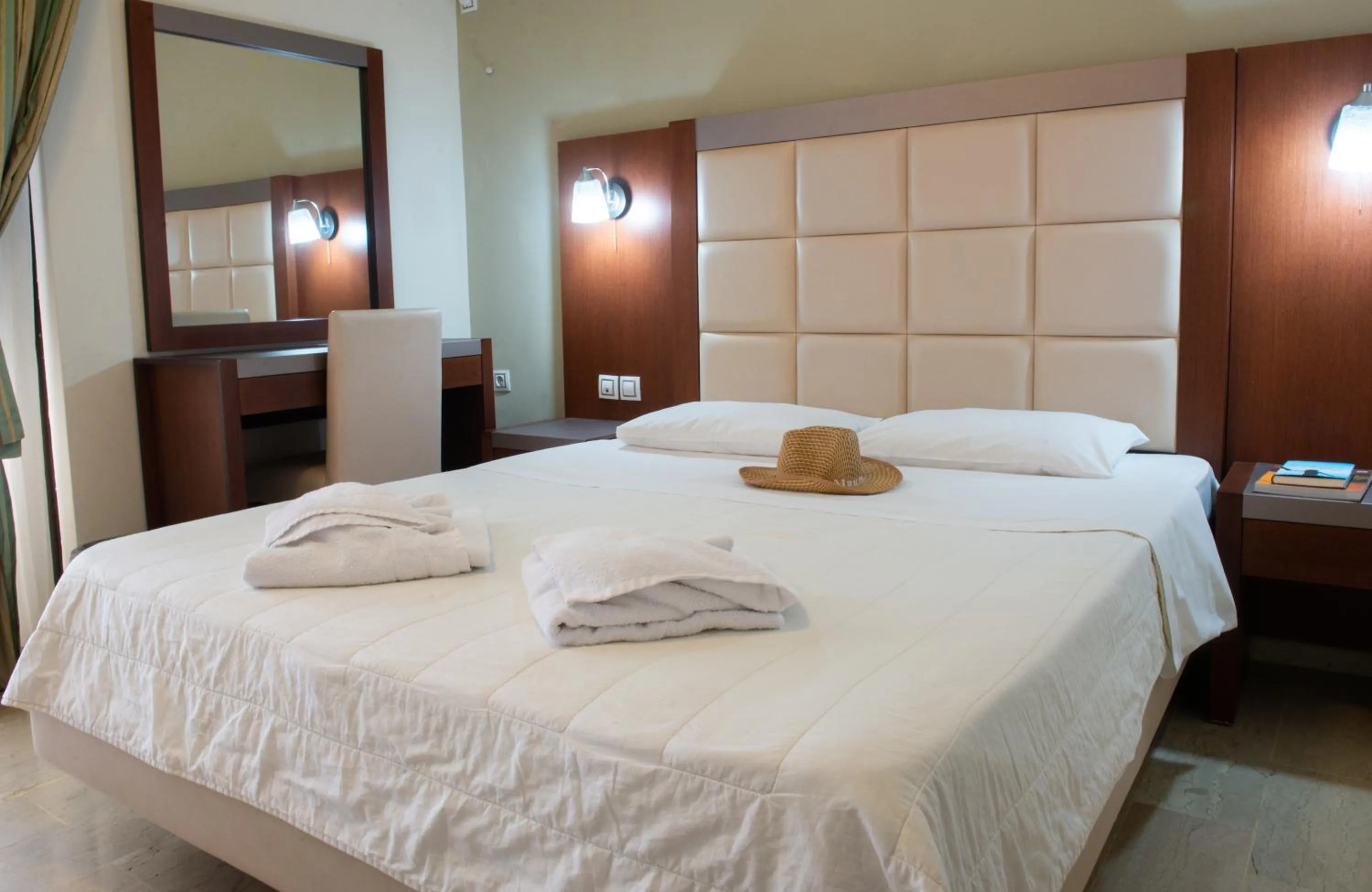 Bed in GOLDEN SUN Κokkoni Beach Hotel