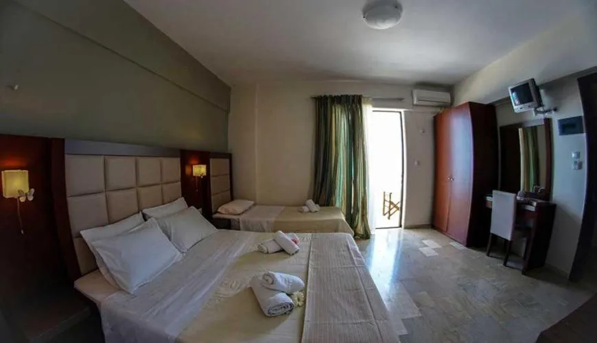 Bed in GOLDEN SUN Κokkoni Beach Hotel