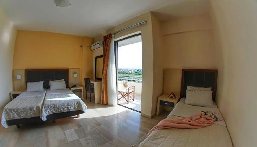 Bed in GOLDEN SUN Κokkoni Beach Hotel