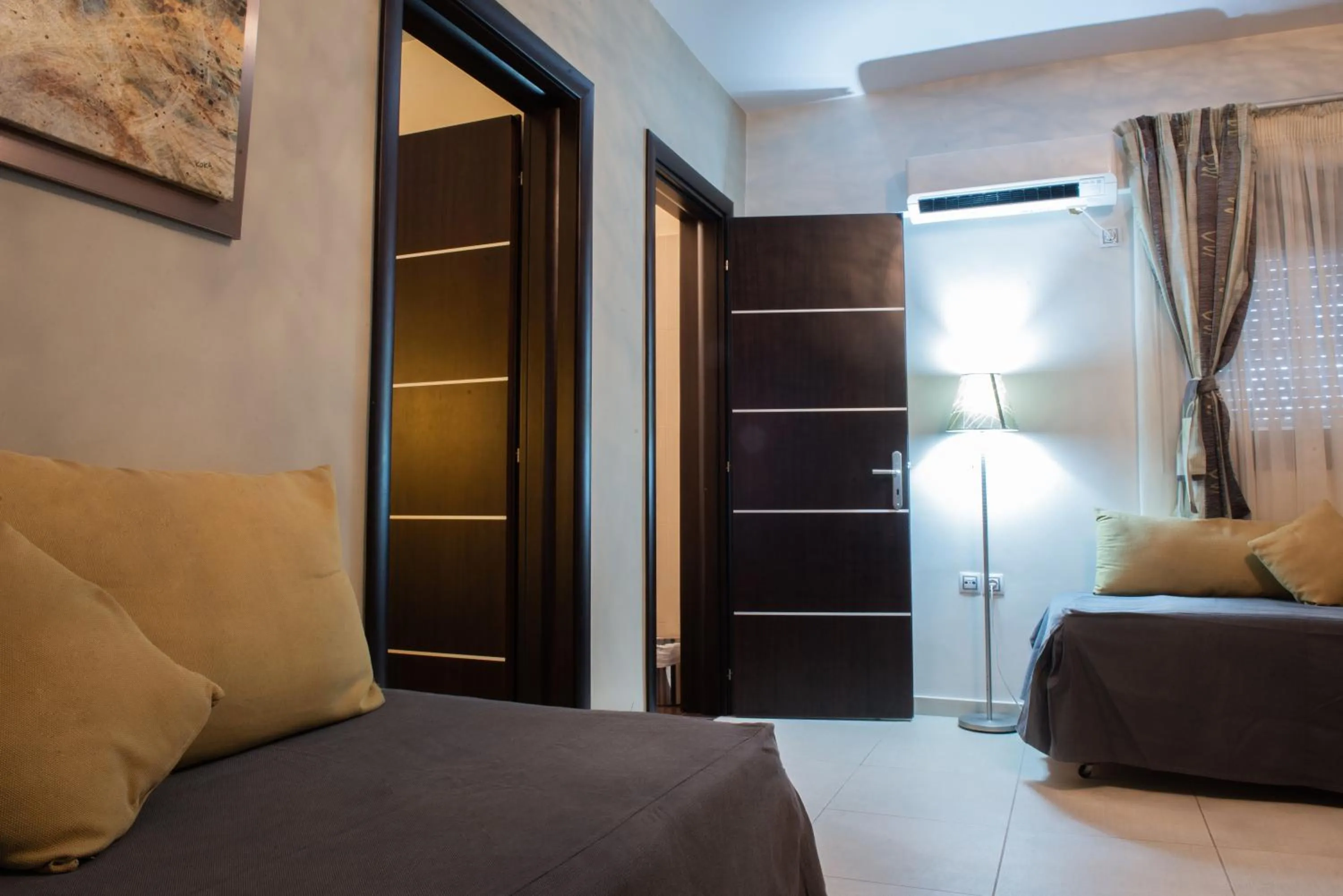 Bed in GOLDEN SUN Κokkoni Beach Hotel