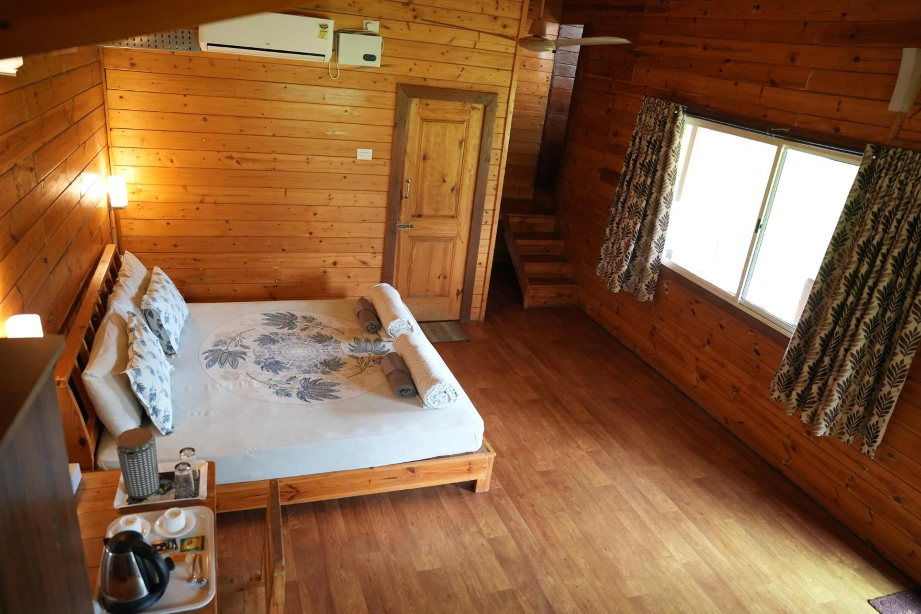 Photo of the whole room, Bed in labdhi Resorts Masinagudi- Stag Groups not allowed