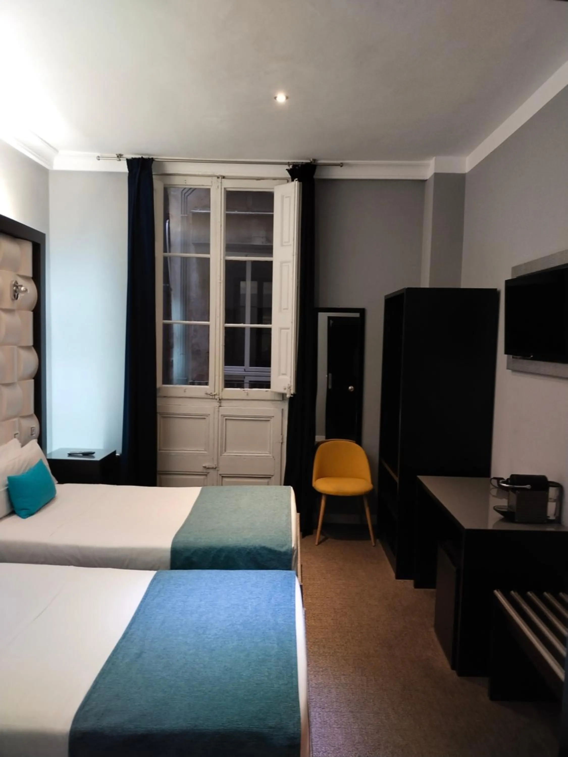 Bed in Amra Barcelona Gran Via