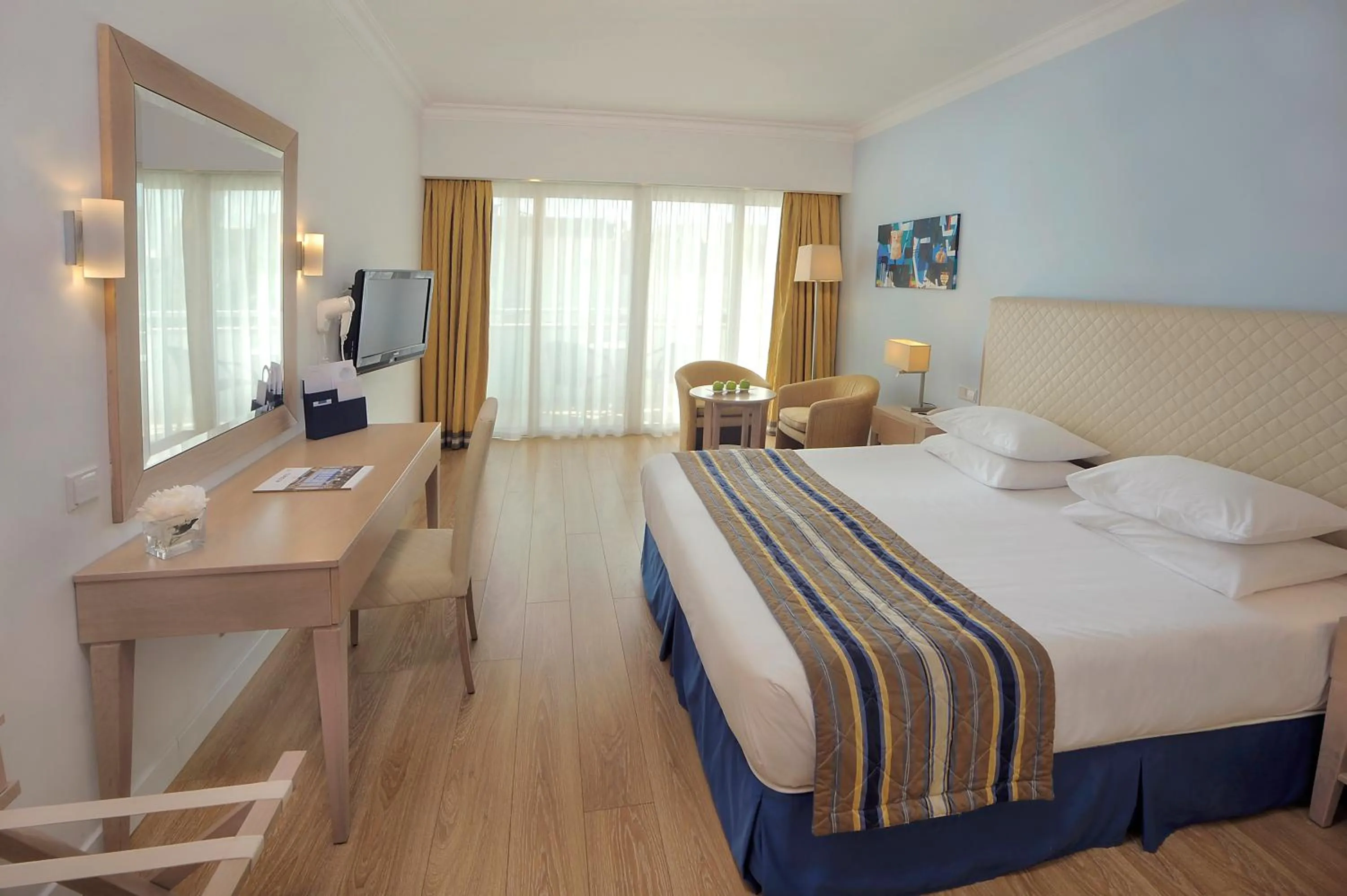 Bedroom, Bed in Olympic Lagoon Resort Paphos