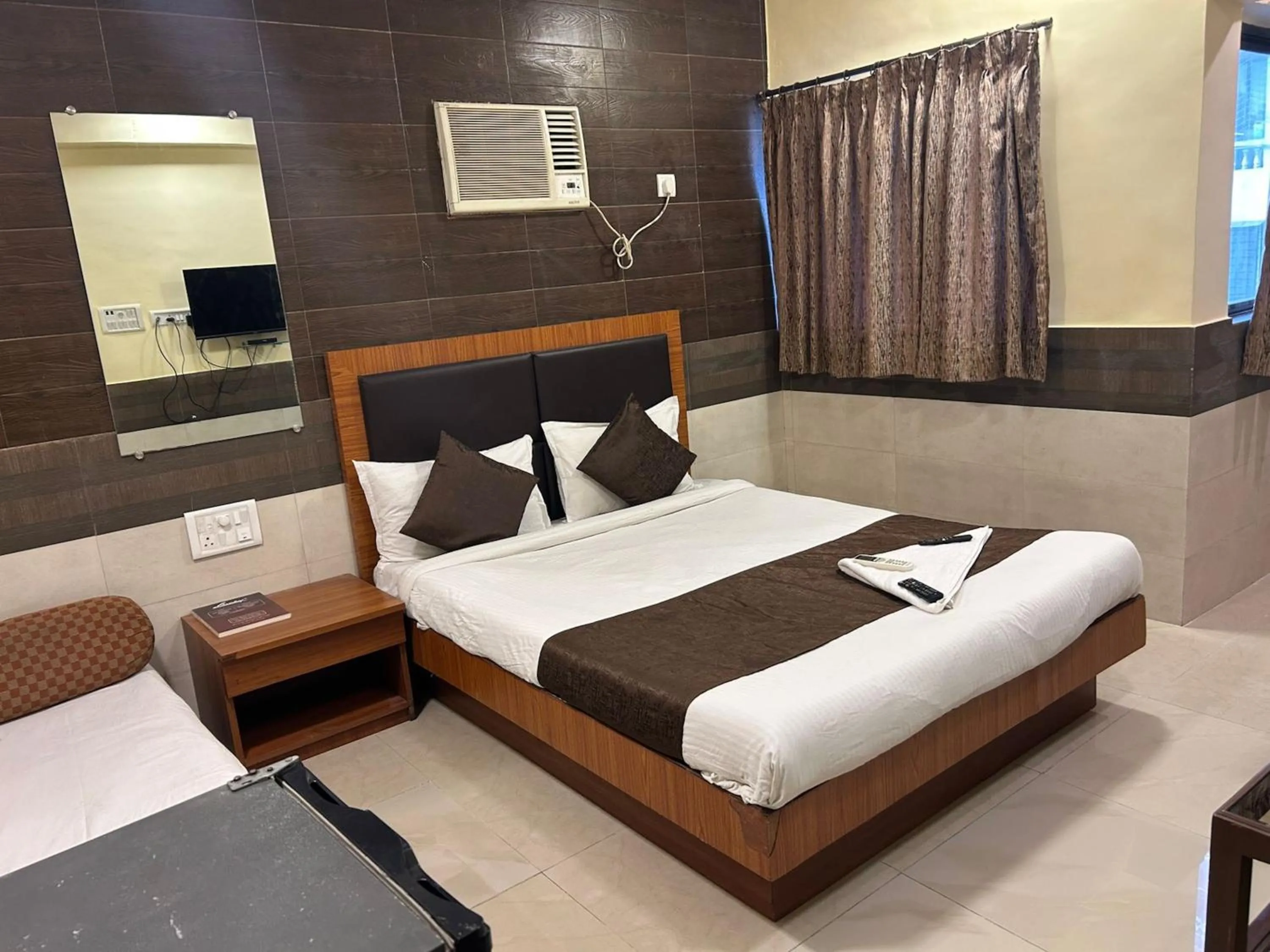 Photo of the whole room, Bed in Hotel Lucky Bandra