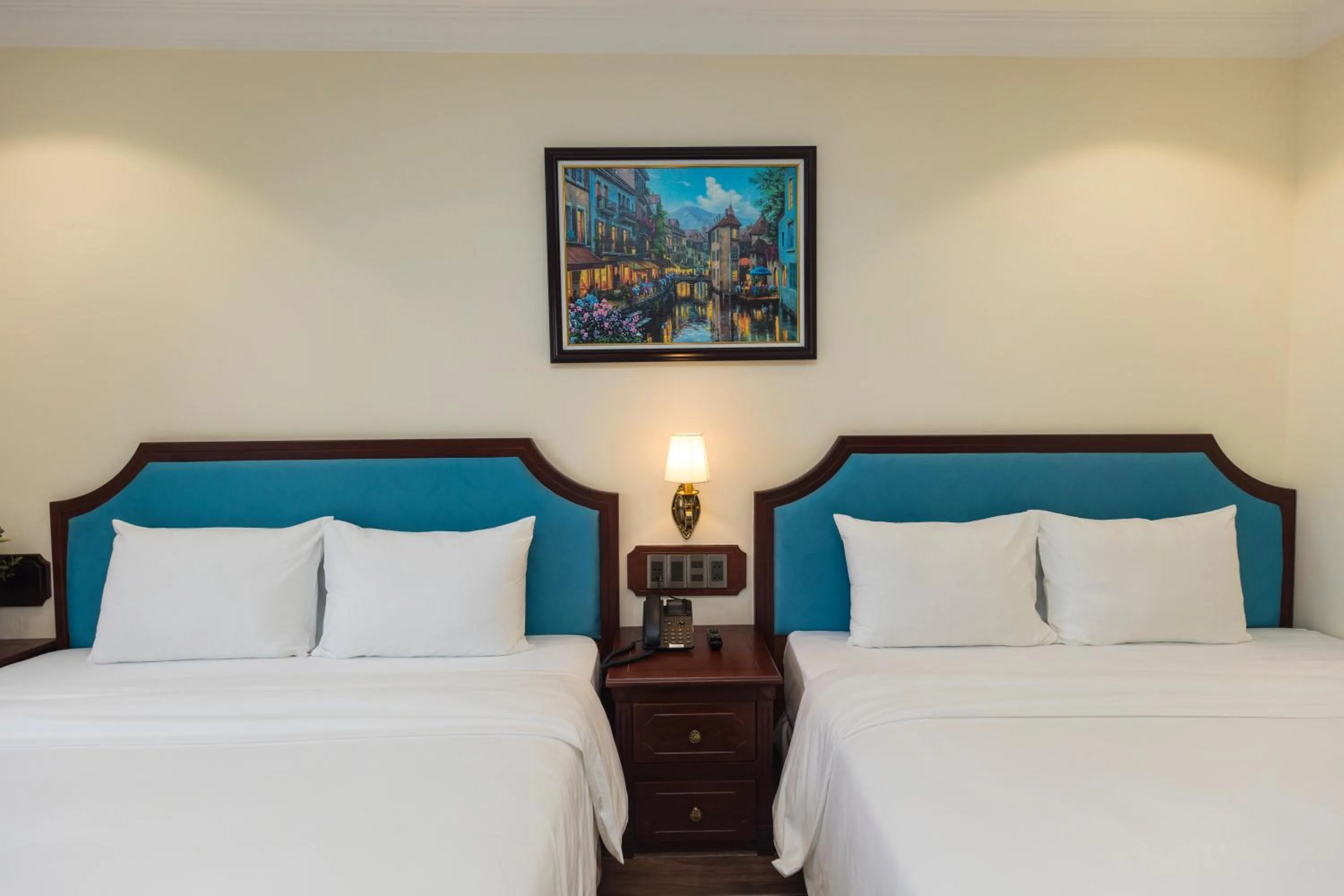 Bed in CALYSSA HOTELS & VILLAGE