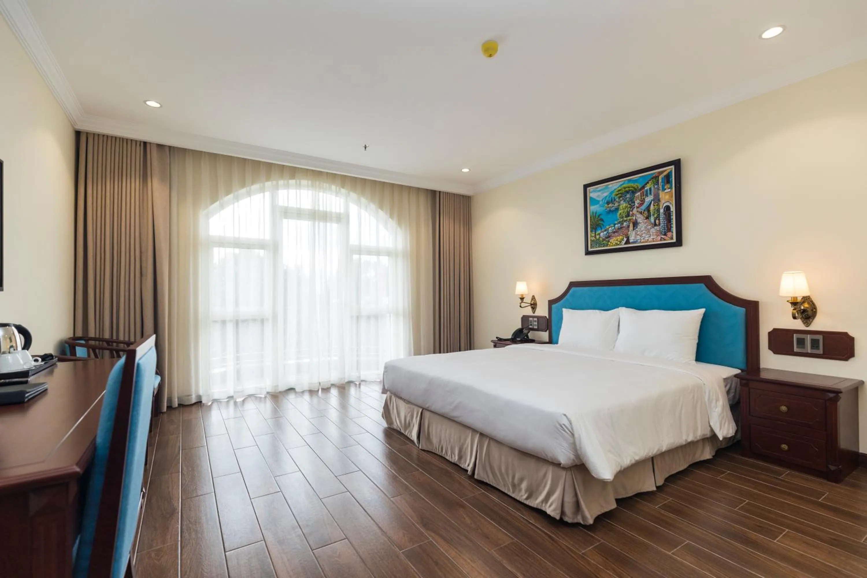 Bed in CALYSSA HOTELS & VILLAGE