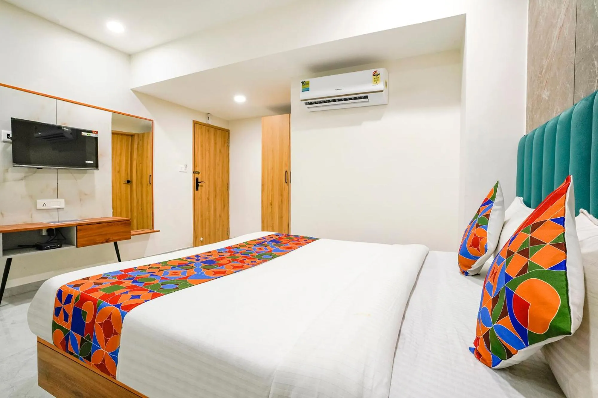 Bed in FabHotel Namantra - Nr Apollo Circle Sardar Patel Ring Road