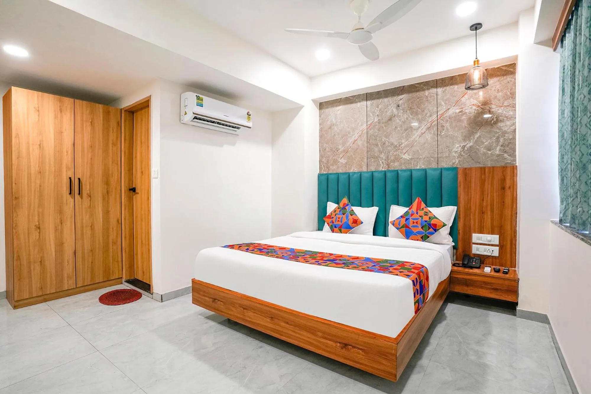 Bed in FabHotel Namantra - Nr Apollo Circle Sardar Patel Ring Road