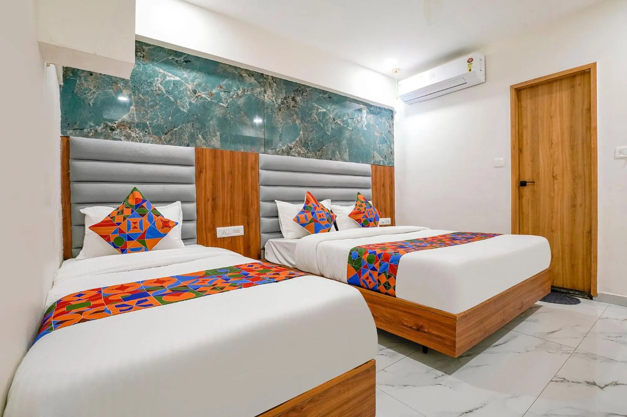 Bed in FabHotel Namantra - Nr Apollo Circle Sardar Patel Ring Road