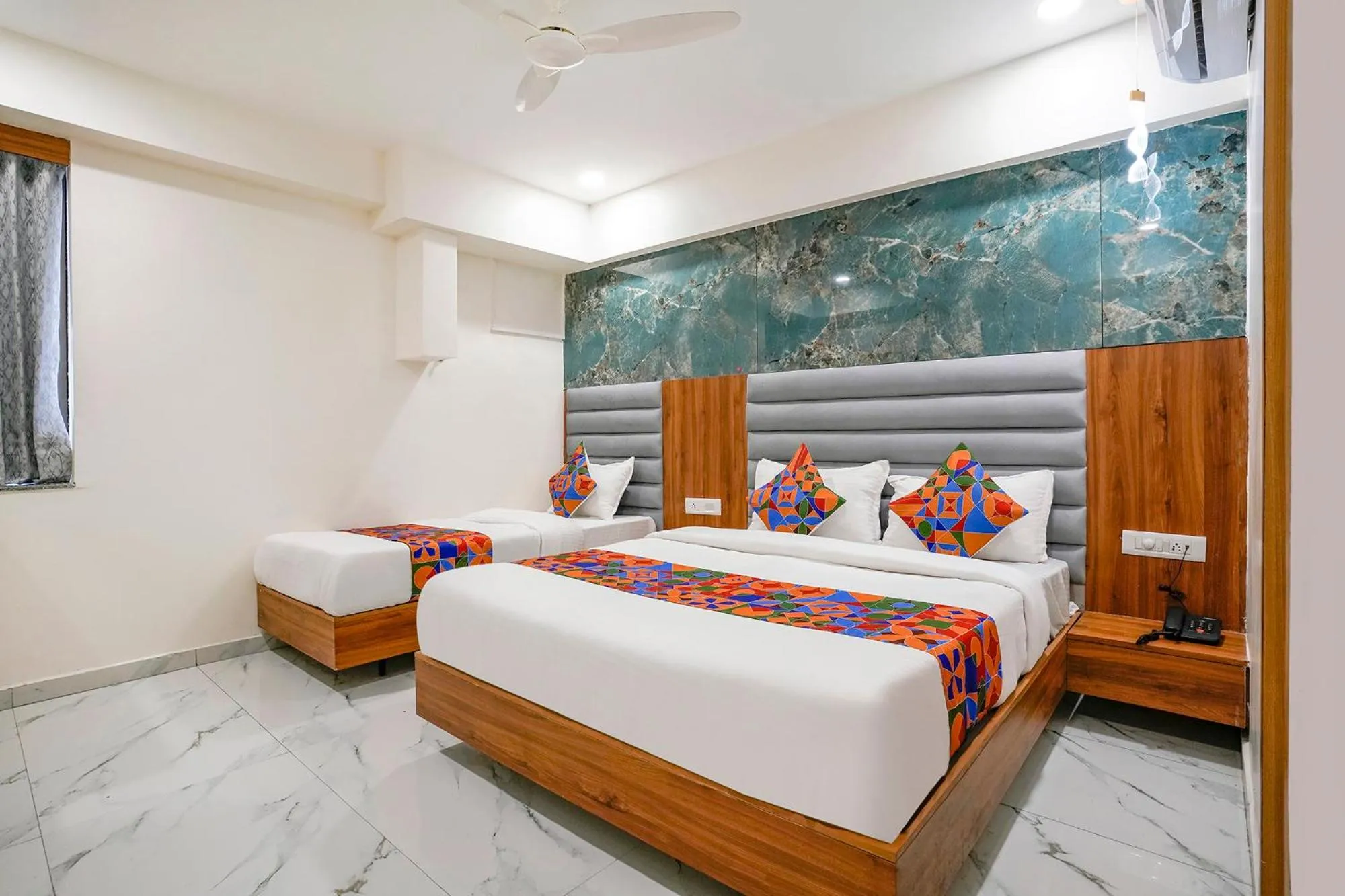 Bed in FabHotel Namantra - Nr Apollo Circle Sardar Patel Ring Road