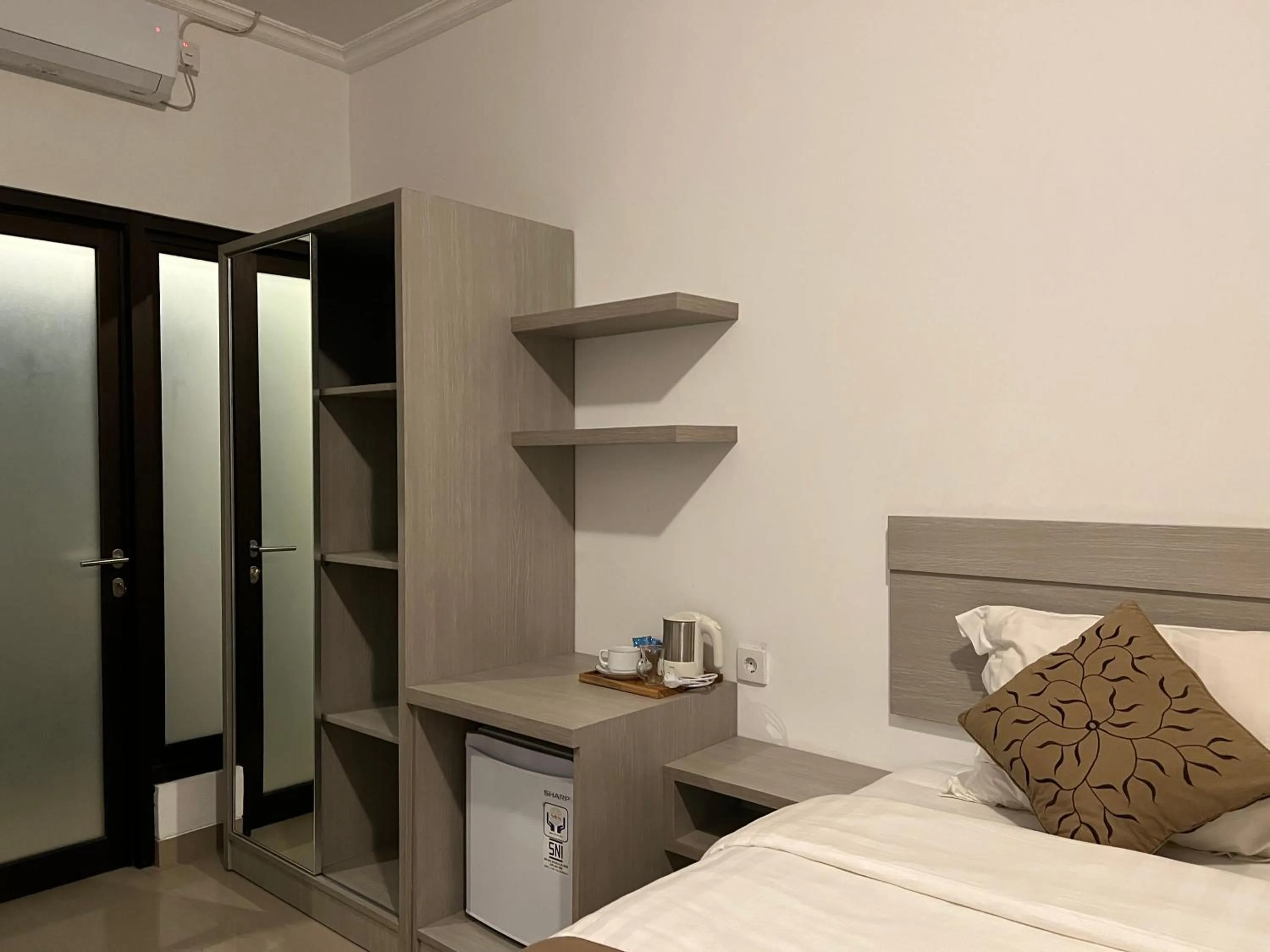 Bed in New W Guest House