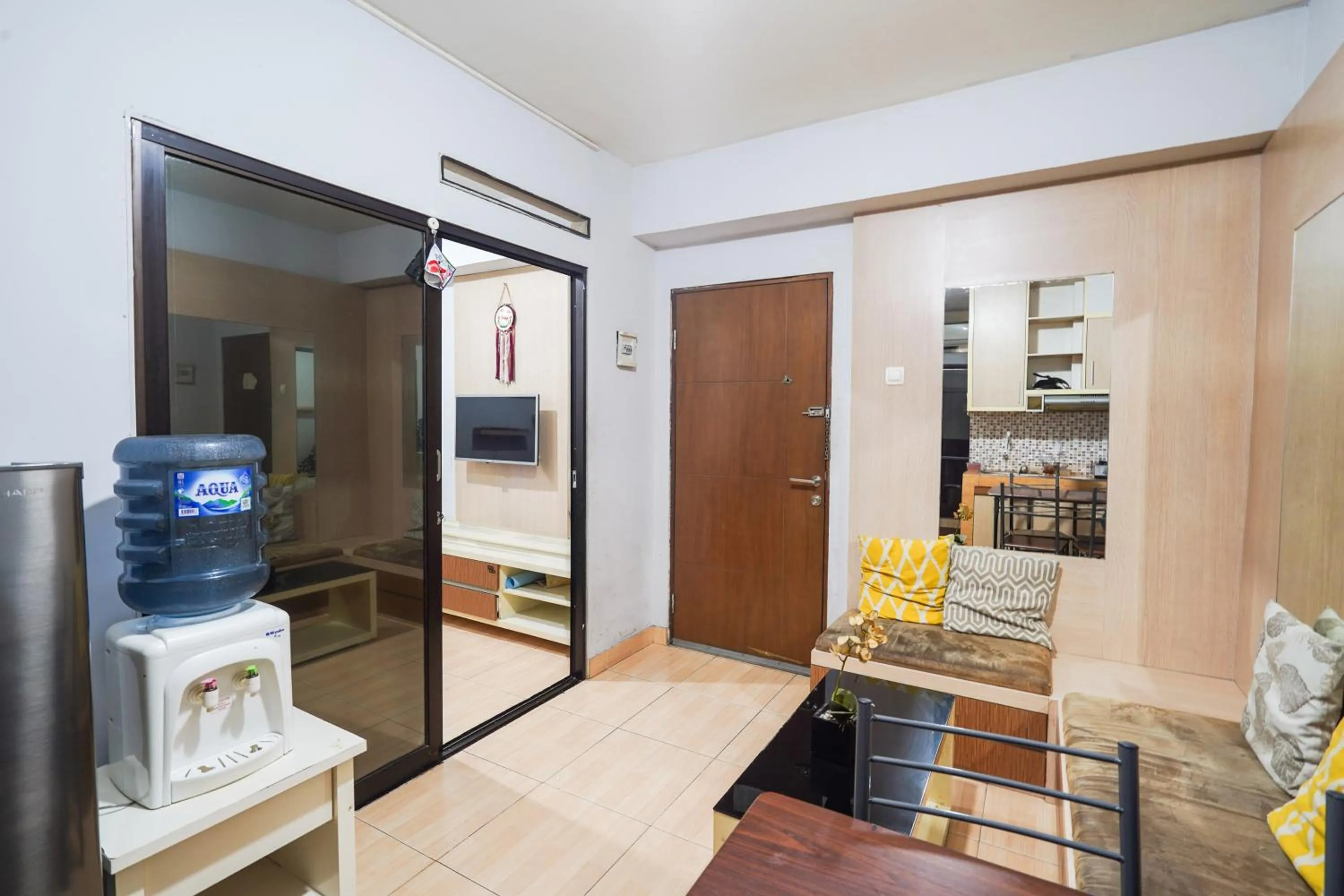 Bedroom in OYO 93545 Gateway Cicadas Apartment By Barbie Homestay