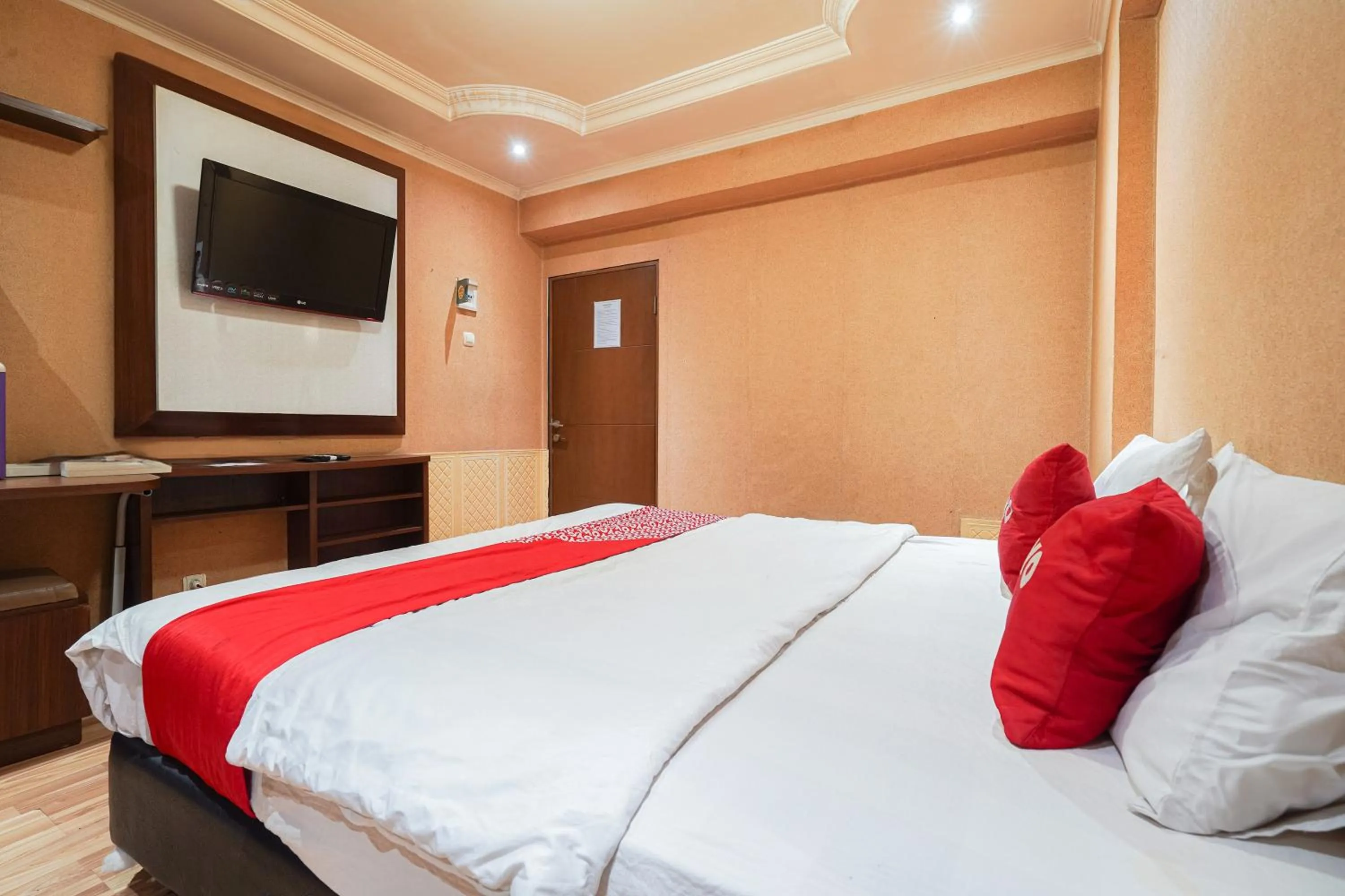 Bedroom in OYO 93545 Gateway Cicadas Apartment By Barbie Homestay