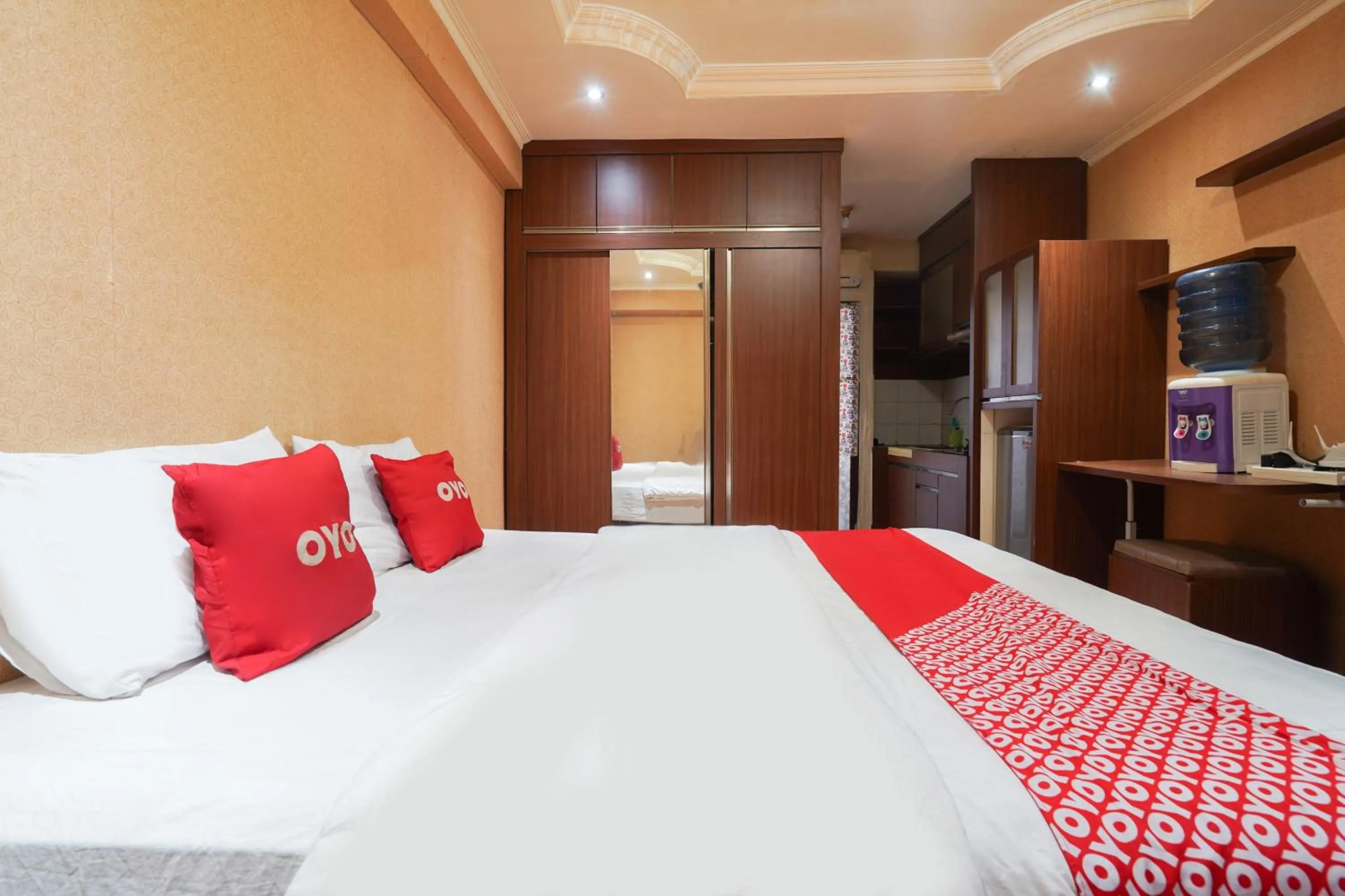 Bedroom in OYO 93545 Gateway Cicadas Apartment By Barbie Homestay