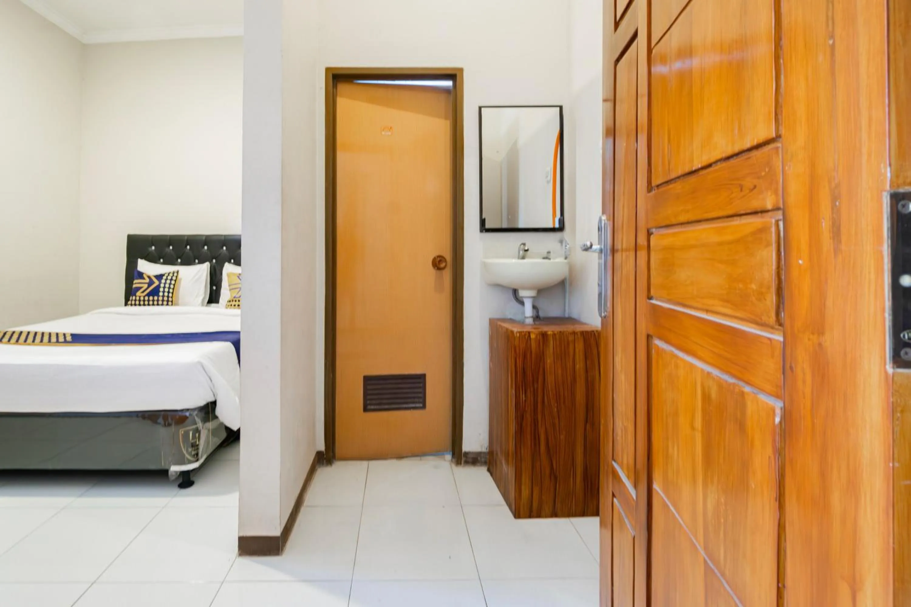 Bedroom, Bed in Hotel O Triple N Homestay