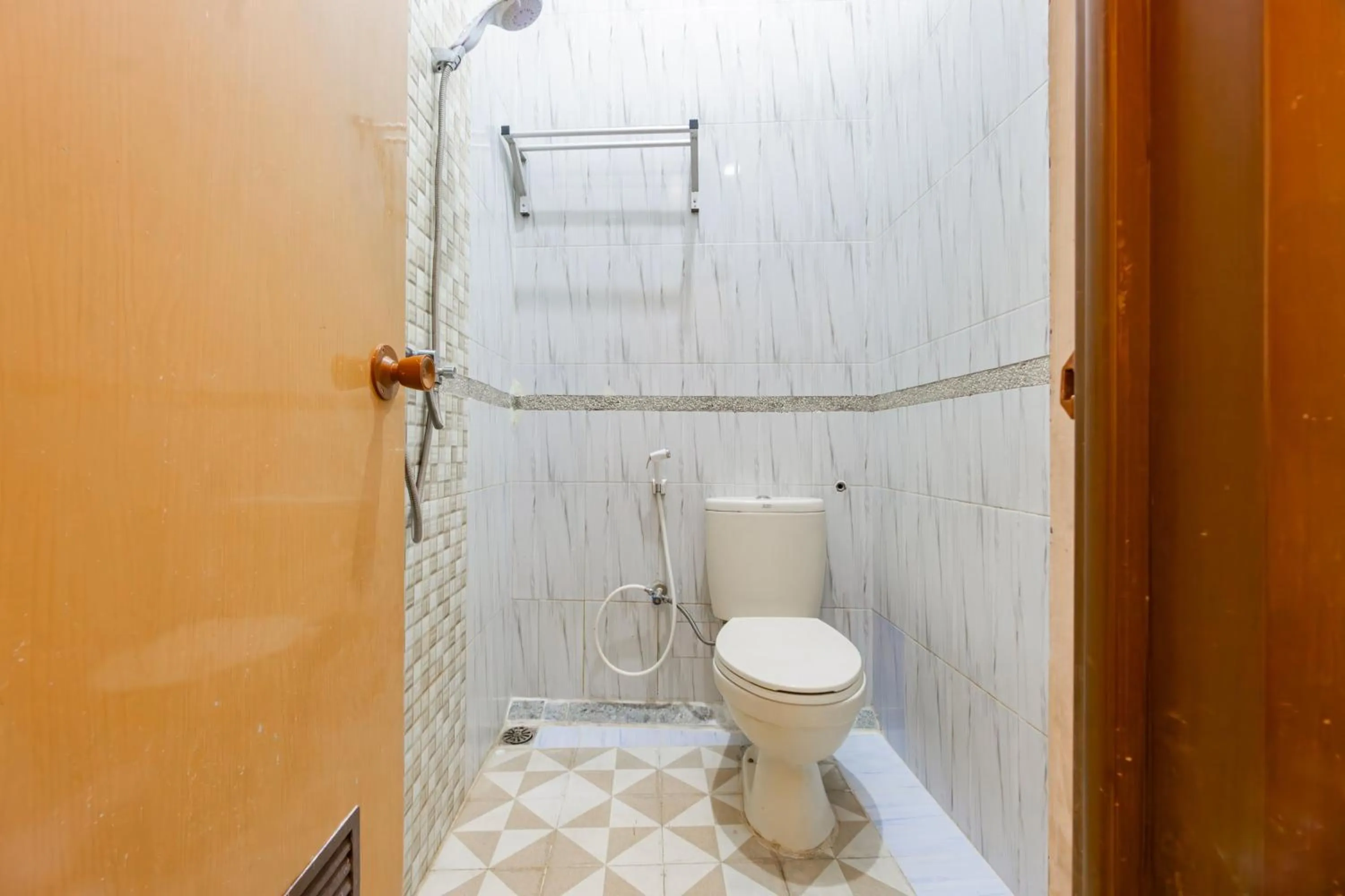 Bathroom in Hotel O Triple N Homestay