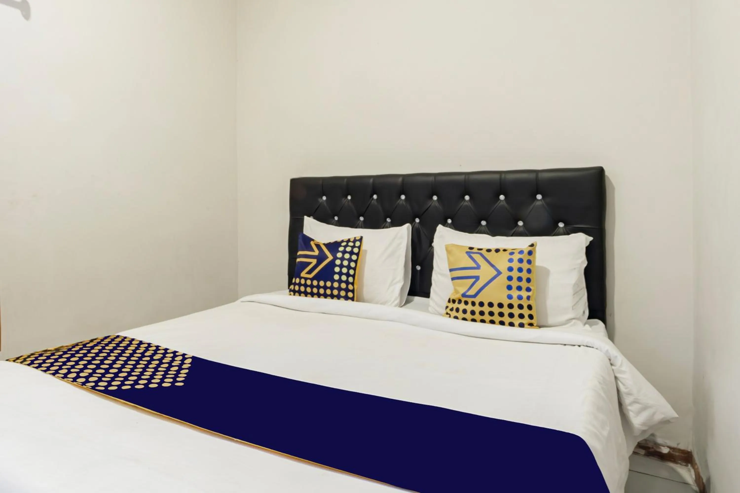 Bedroom, Bed in Hotel O Triple N Homestay