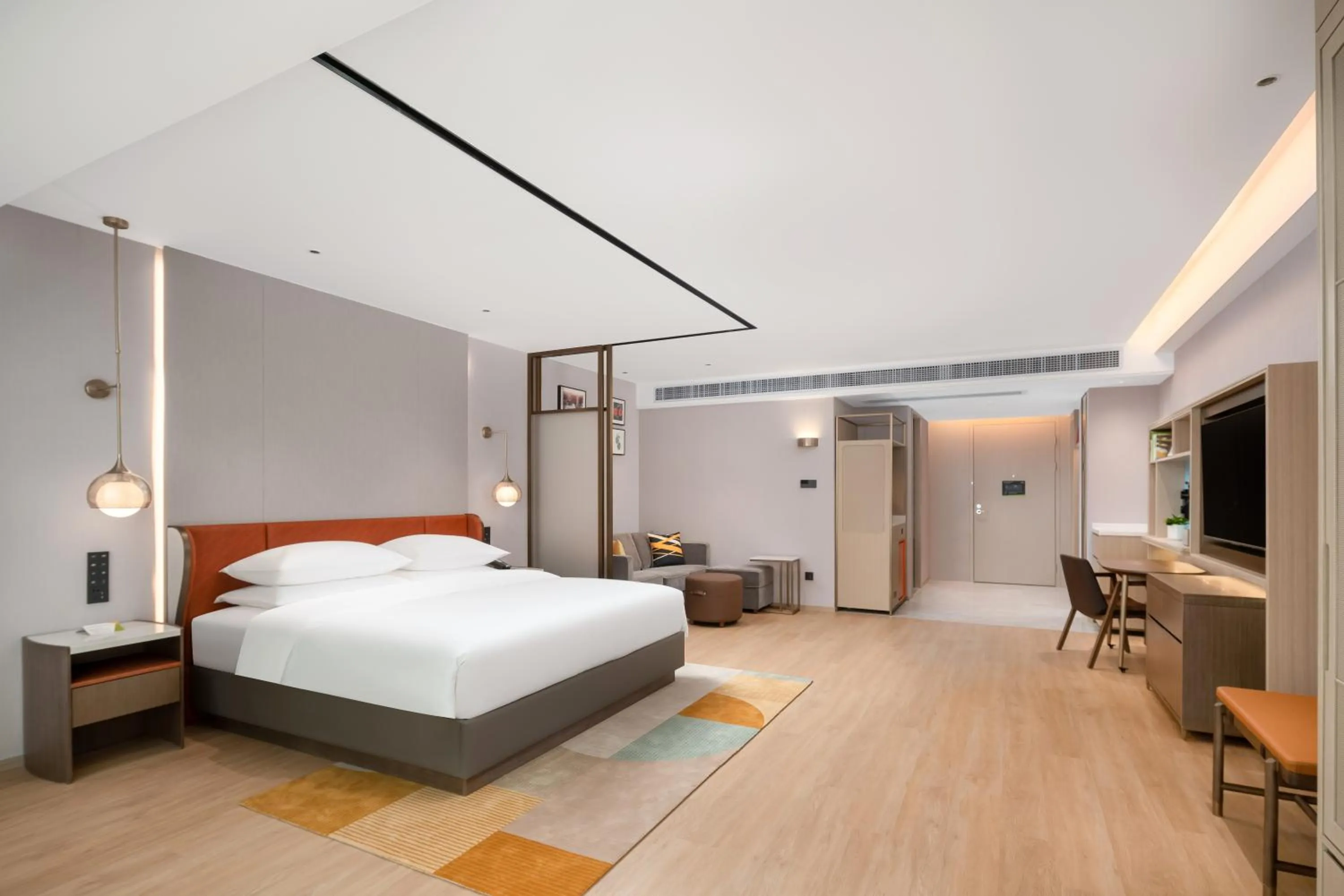 Bed in Home2 Suite by Hilton Dongguan Shijie