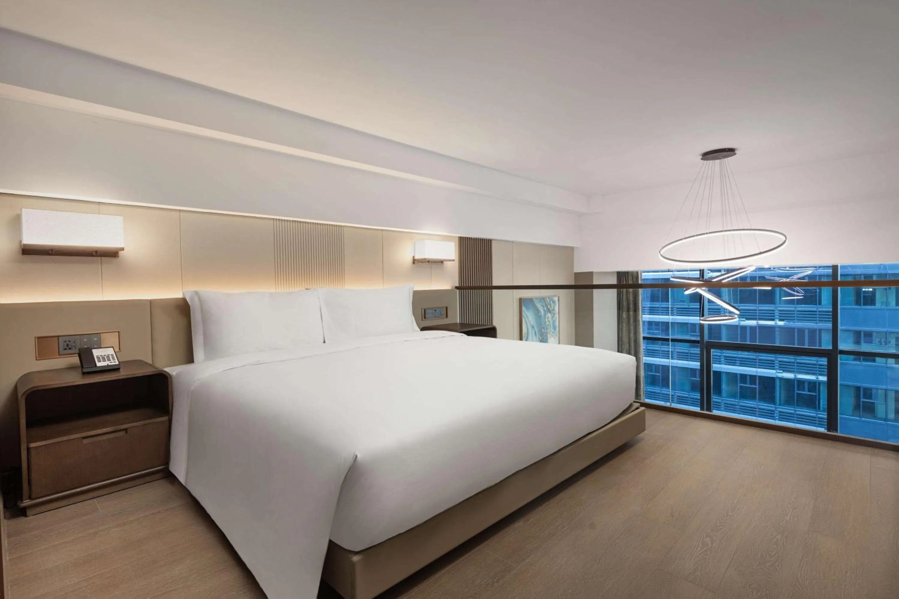 Photo of the whole room, Bed in Wyndham Dalian Jinpu
