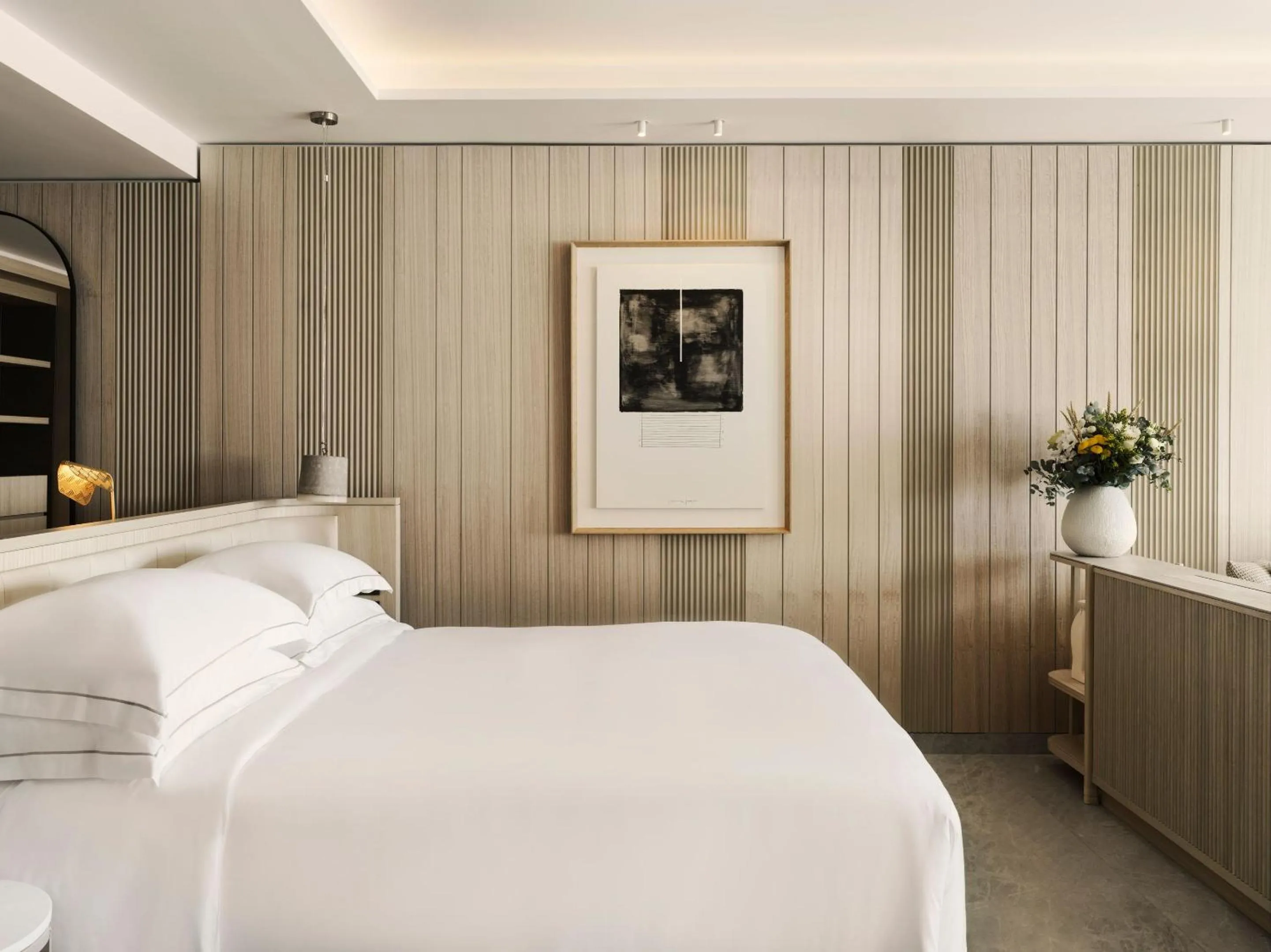 Bed in Deos Mykonos - A Myconian Collection Hotel