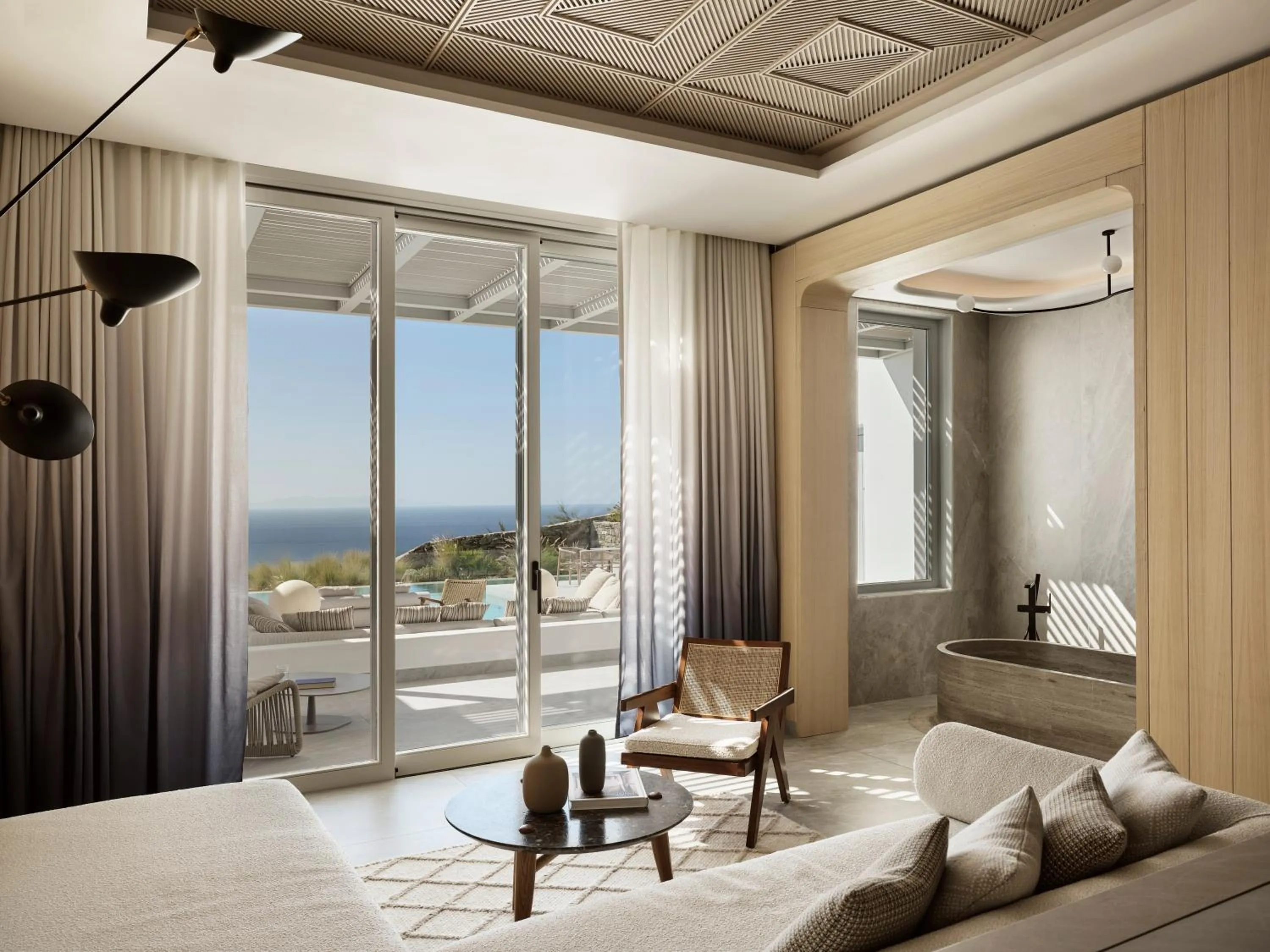 Living room, Bed in Deos Mykonos - A Myconian Collection Hotel