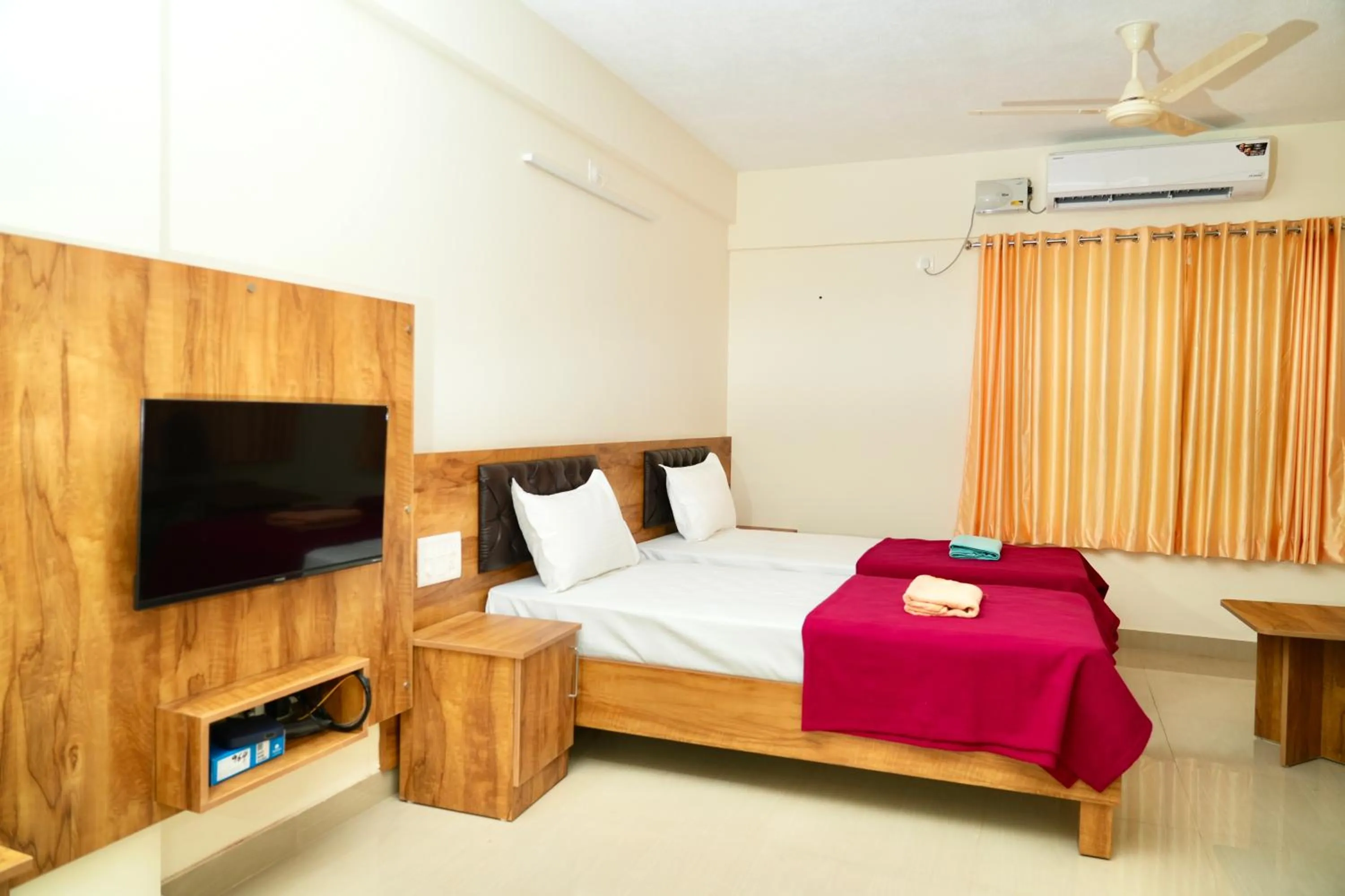 Bedroom, Bed in Shree Swarna Comforts