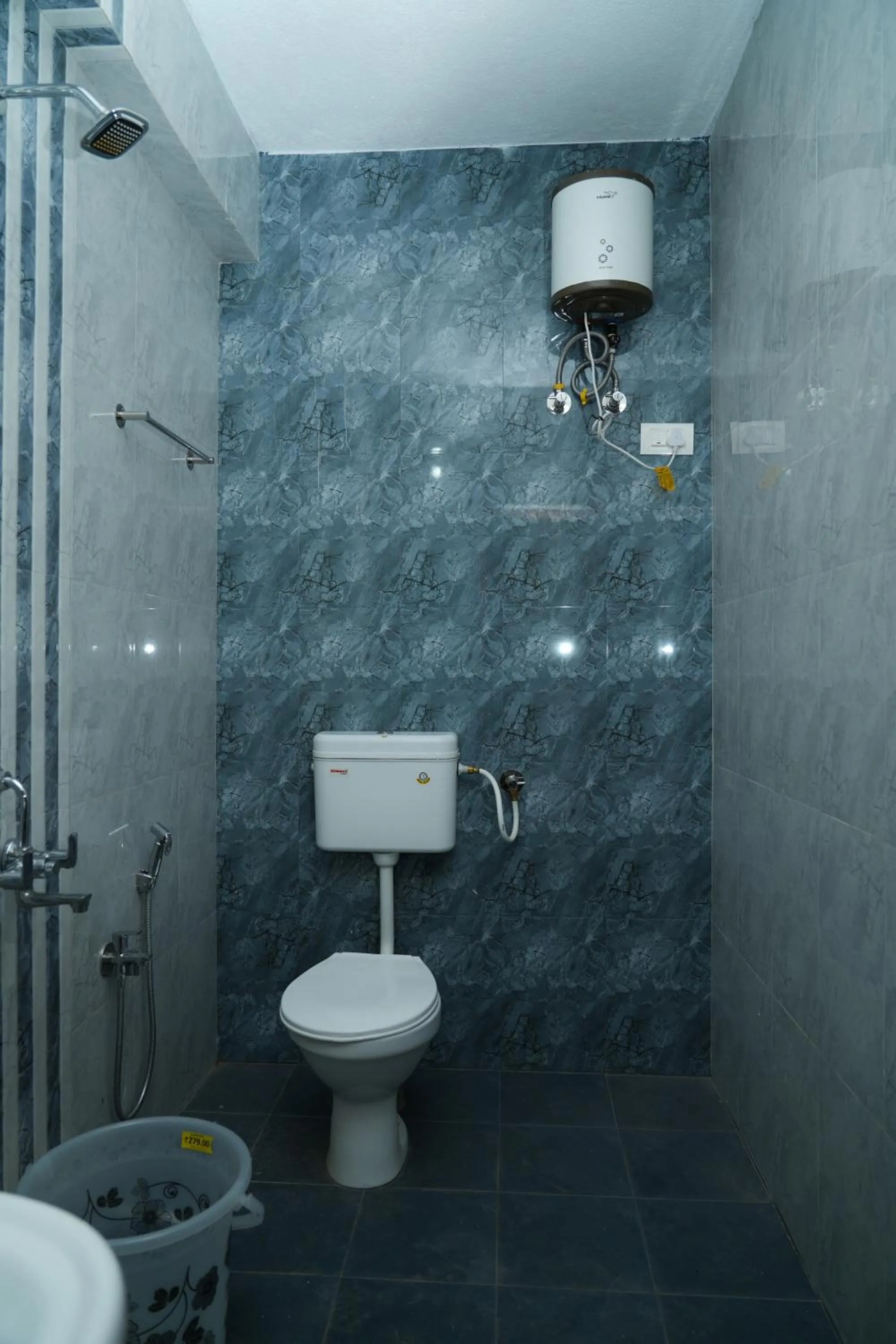 Toilet in Shree Swarna Comforts