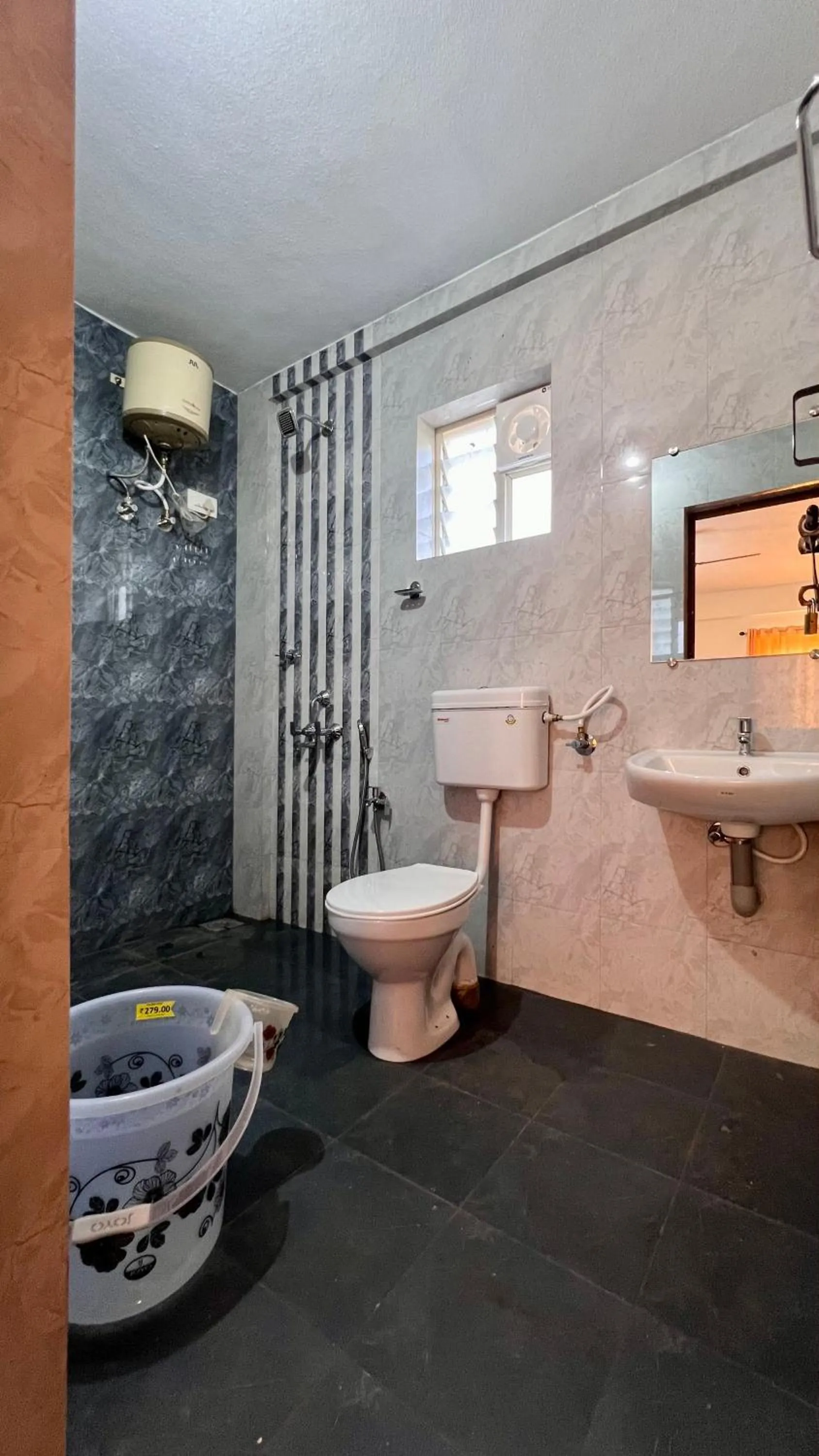 Bathroom in Shree Swarna Comforts