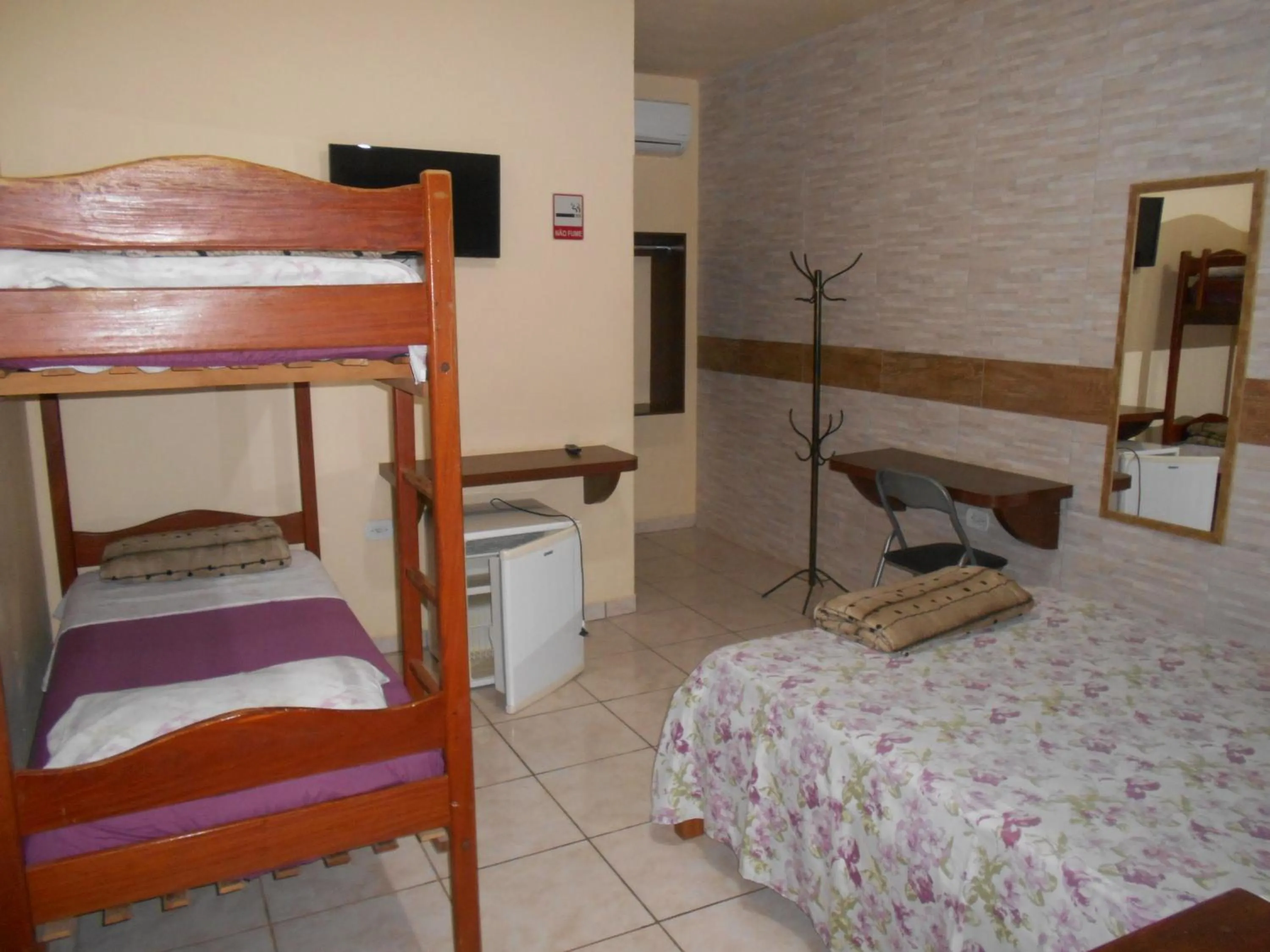 Bed in Pousada Paraiso