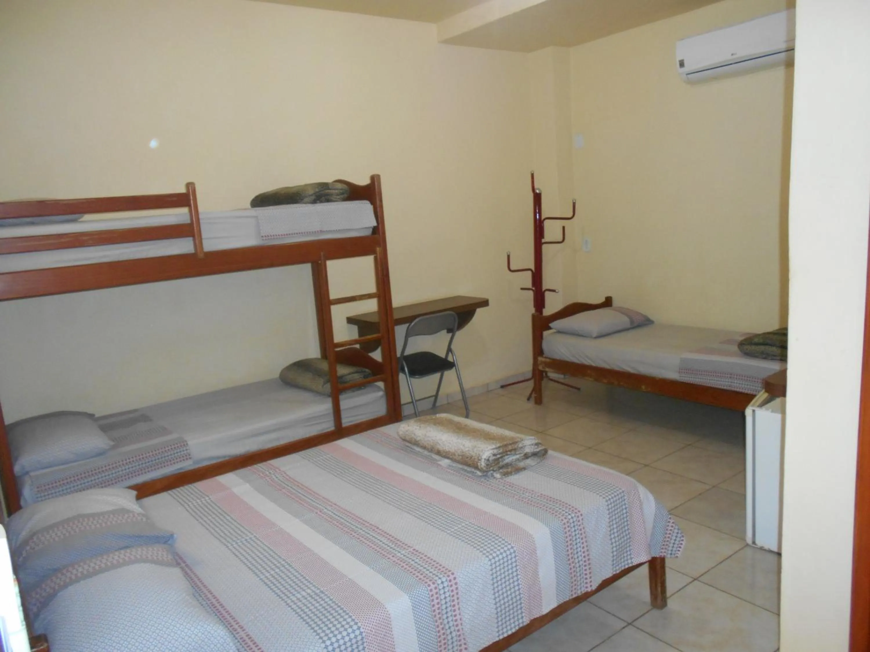 Bed in Pousada Paraiso