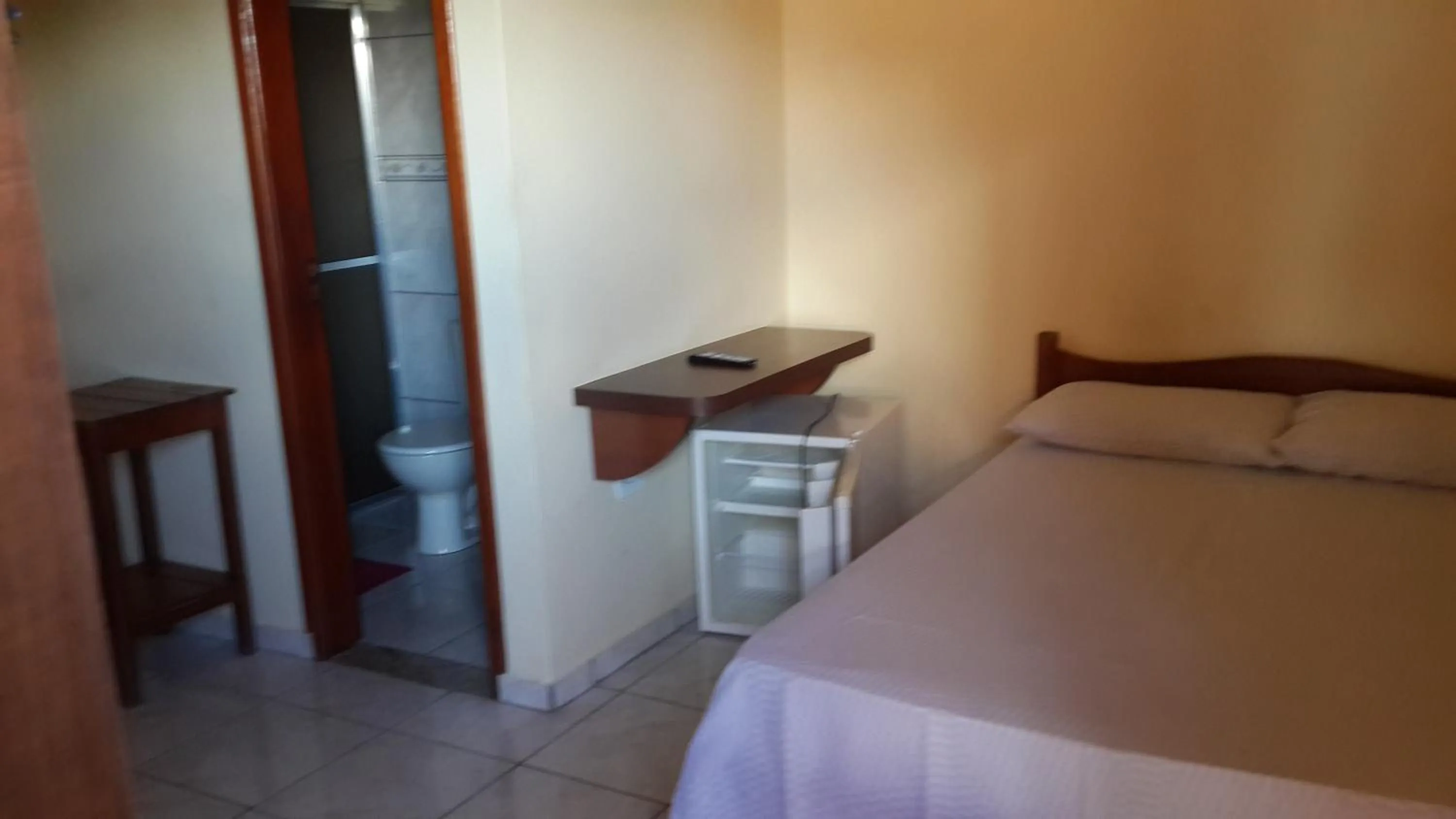 Photo of the whole room, Bed in Pousada Paraiso