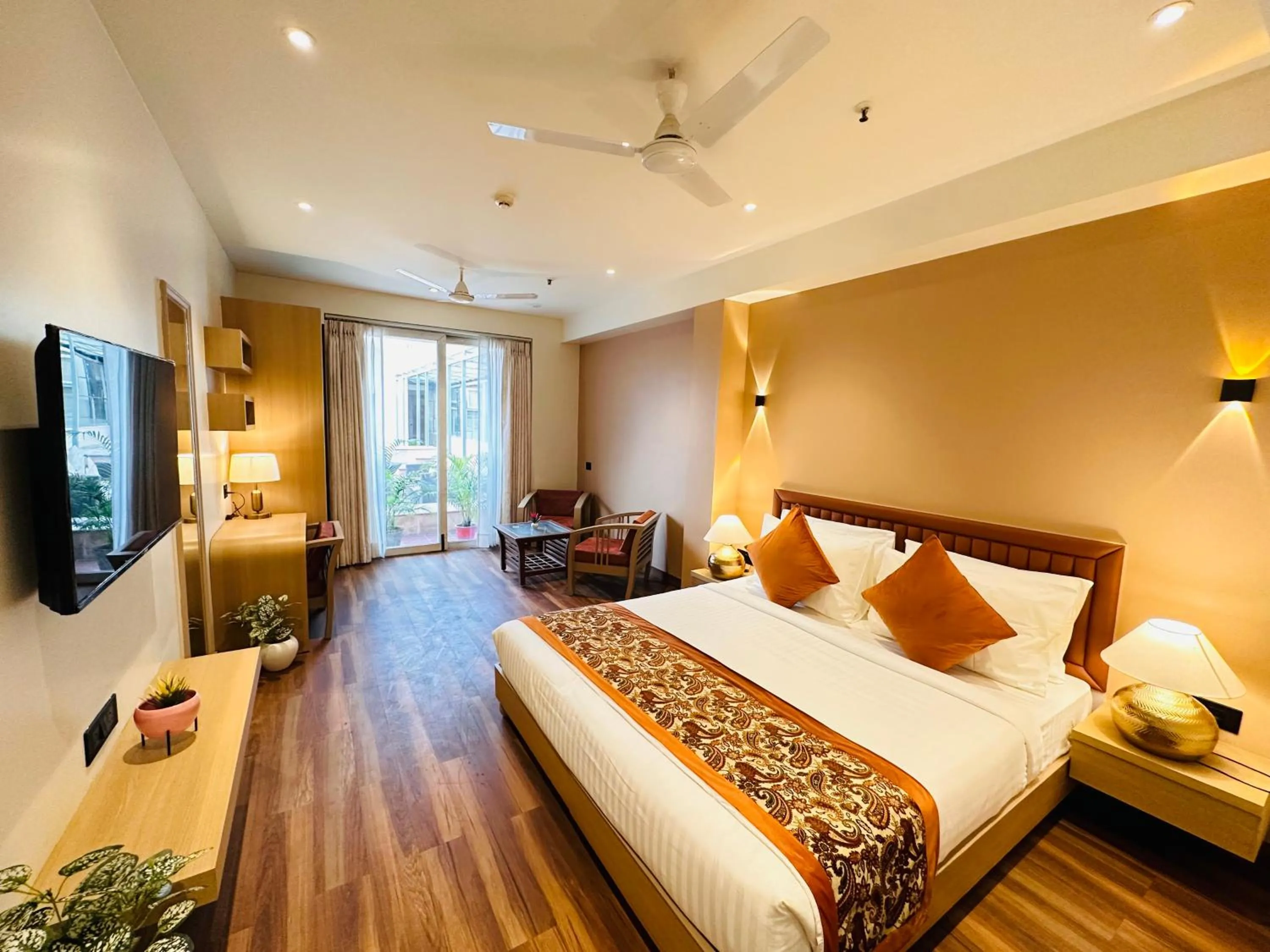 Communal lounge/ TV room, Bed in Hotel South Ex Residency - South Ex near AIIMS Delhi - Couple Friendly
