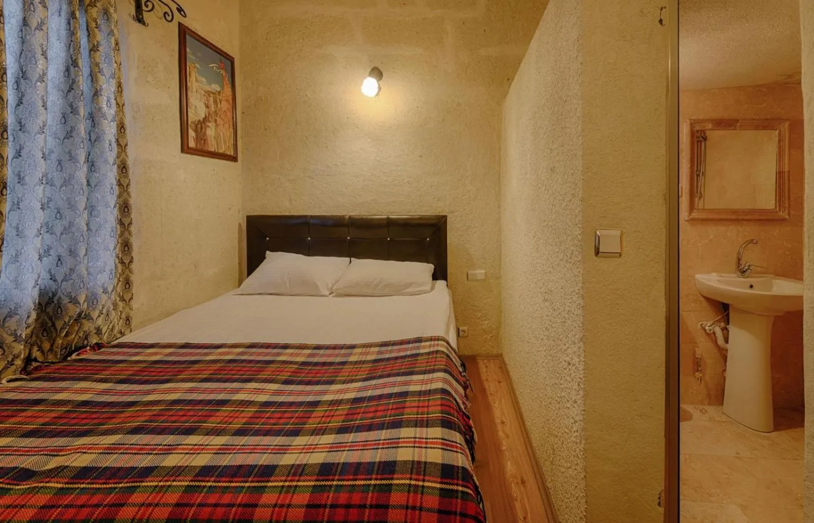 Bed in Avlu Cave House