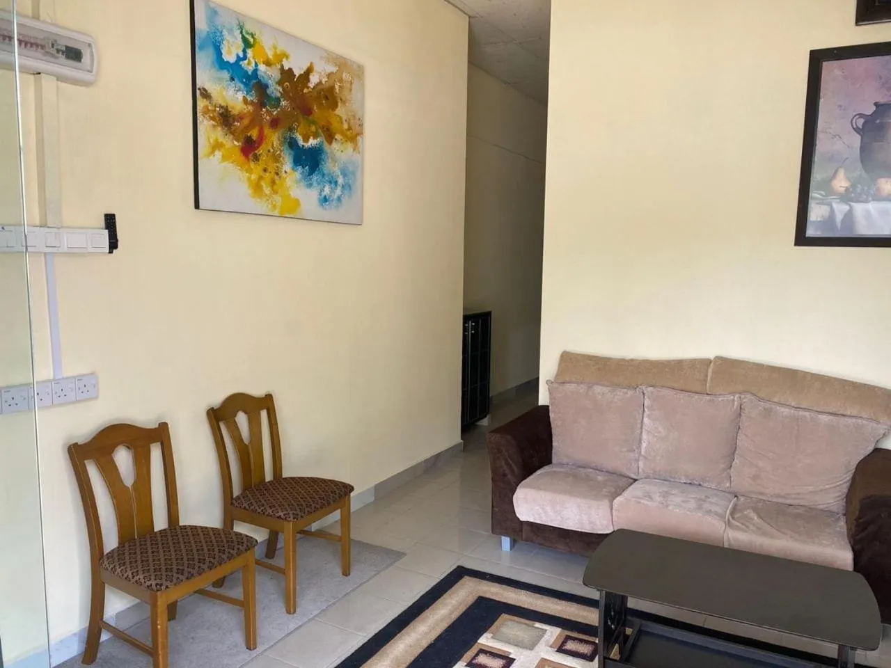 Living room in Hotel O Ray Yan Guesthouse