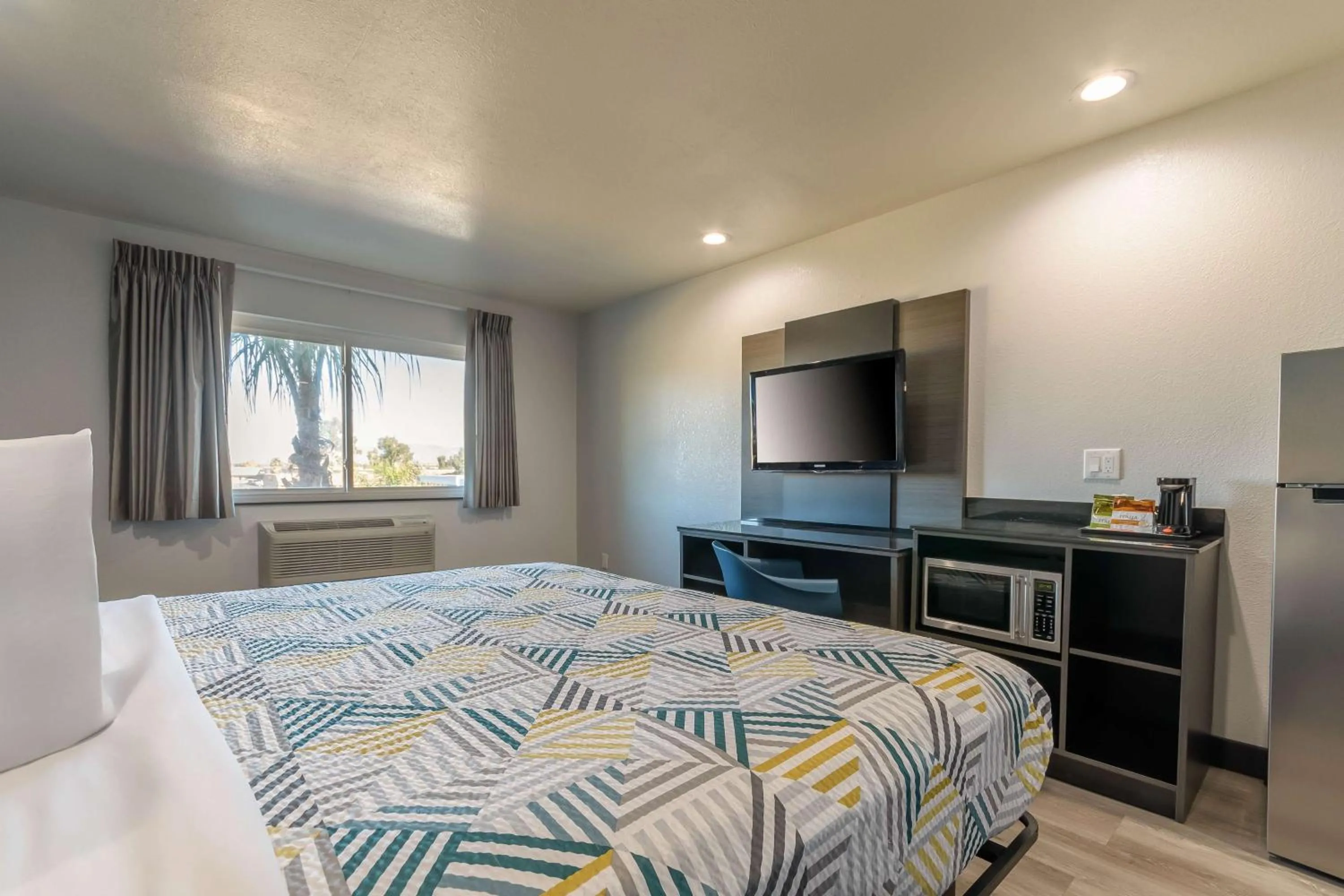 Bedroom, Bed in Studio 6 Suites Perris, CA